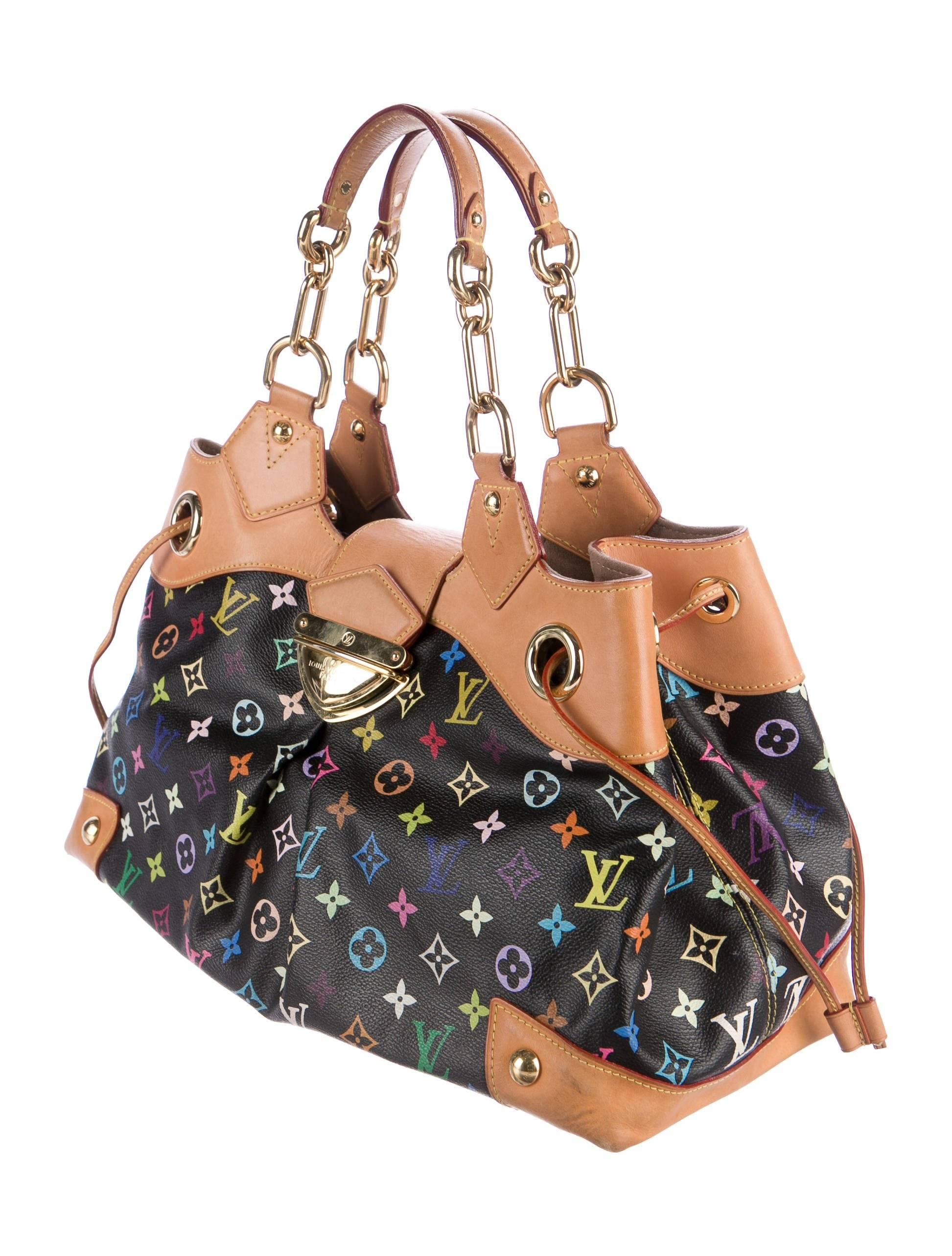 Limited Edition. From the Takashi Murakami Collection. Black and multicolor monogram coated canvas Louis Vuitton Multicolore Ursula bag with brass hardware, tan vachetta leather trim, dual flat shoulder straps with chain-link accents, taupe