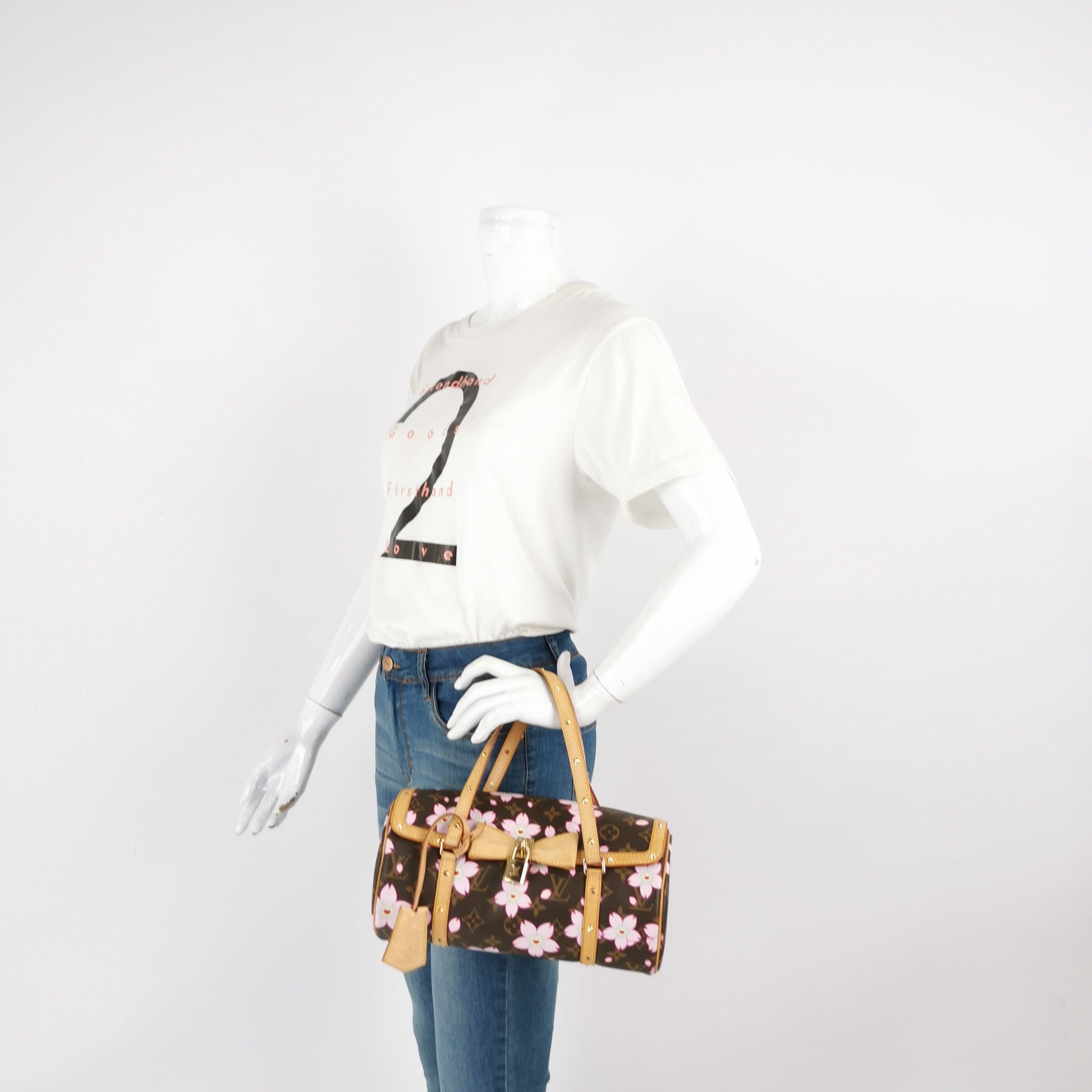 Louis Vuitton x Takashi Murakami Papillon 28 Cherry Blossom Monogram Handbag
These are professional photos of the actual bag.
Design by the French fashion house, Louis Vuitton in collaboration with Takashi Murakami.
Condition: Very Good
This