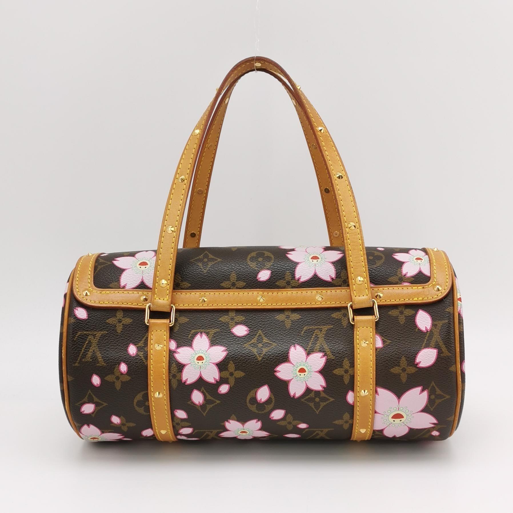 Louis Vuitton x Takashi Murakami Papillon 28 Cherry Blossom Monogram Handbag
These are professional photos of the actual bag.
Design by the French fashion house, Louis Vuitton in collaboration with Takashi Murakami.
Condition: Very Good
This