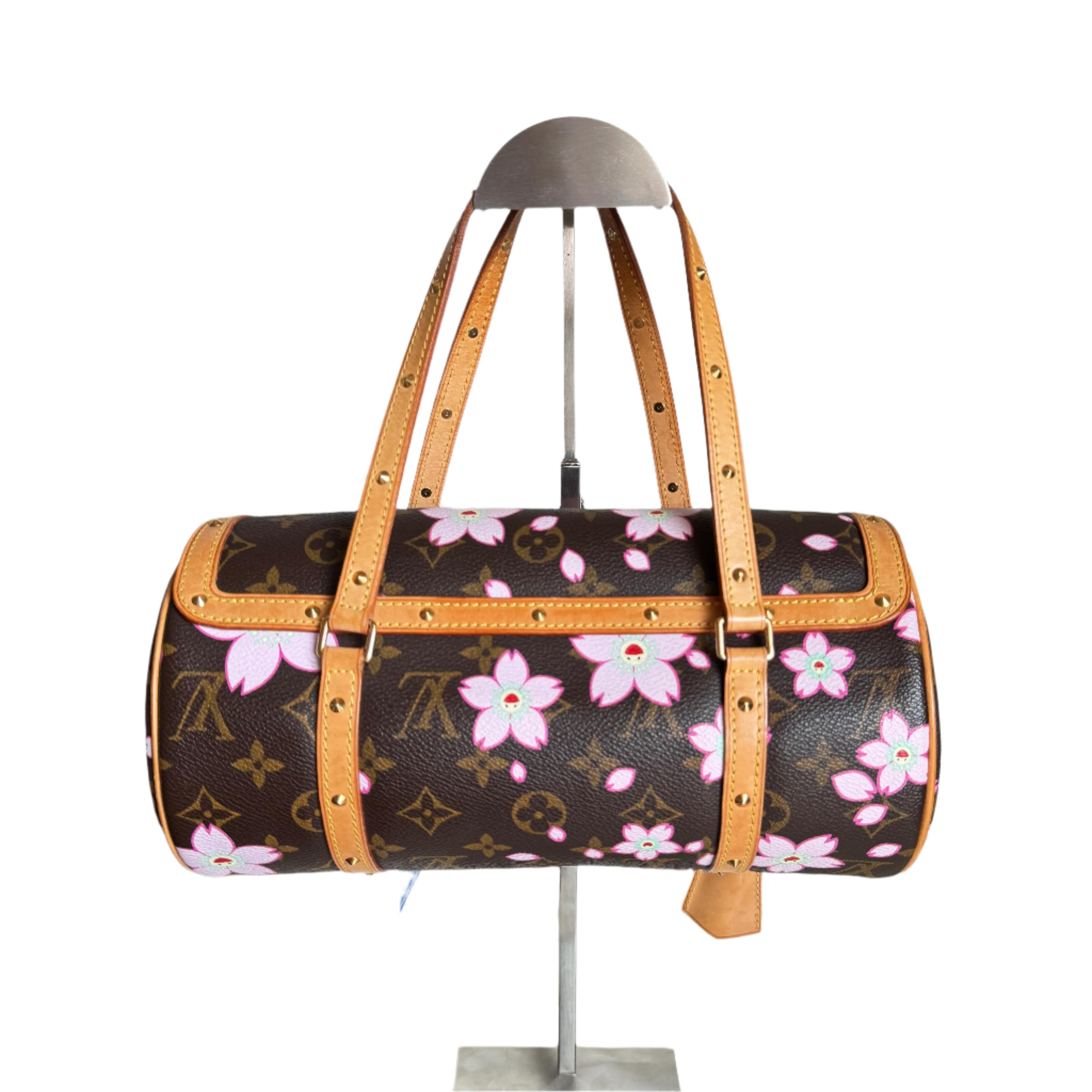 Louis Vuitton x Takashi Murakami Papillon 28 Cherry Blossom Monogram Handbag
These are professional photos of the actual bag.
Design by the French fashion house, Louis Vuitton in collaboration with Takashi Murakami.
Condition: Very Good
This