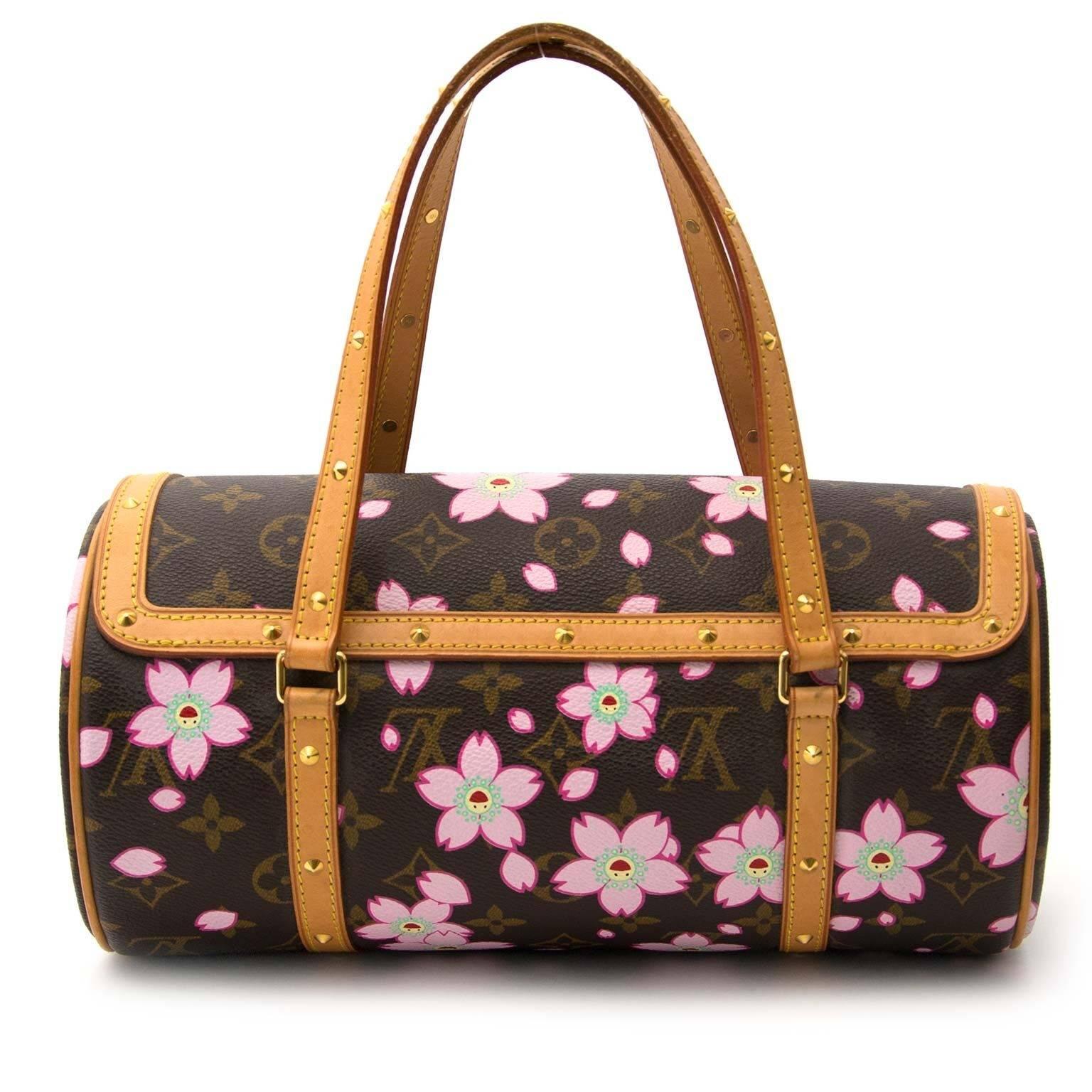 Good preloved condition

Hard To Find Louis Vuitton by Takashi Murakami Papillon Cherry Blossom shoulder bag

Limited edition Takashi Murakami monogram coated canvas and leather trim shoulder bag with gold-tone hardware.

These flowers really bright