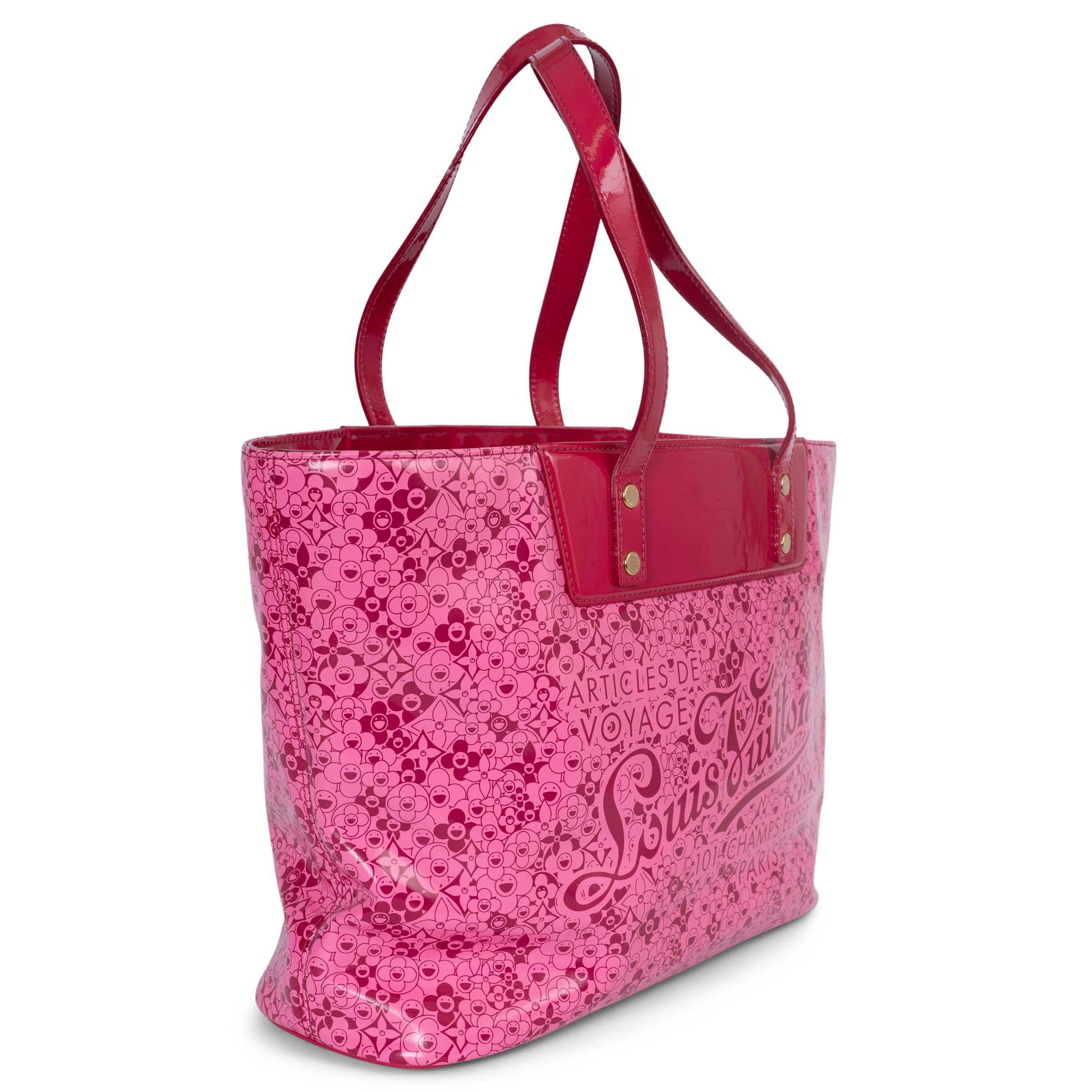 This 100% authentic Louis Vuitton x Takashi Murakami Cosmic Blossom Tote PM is crafted from Rose pink printed coated canvas, featuring vibrant pink patent leather trims and handles. The bag closes securely with a hook on top and is lined in chic