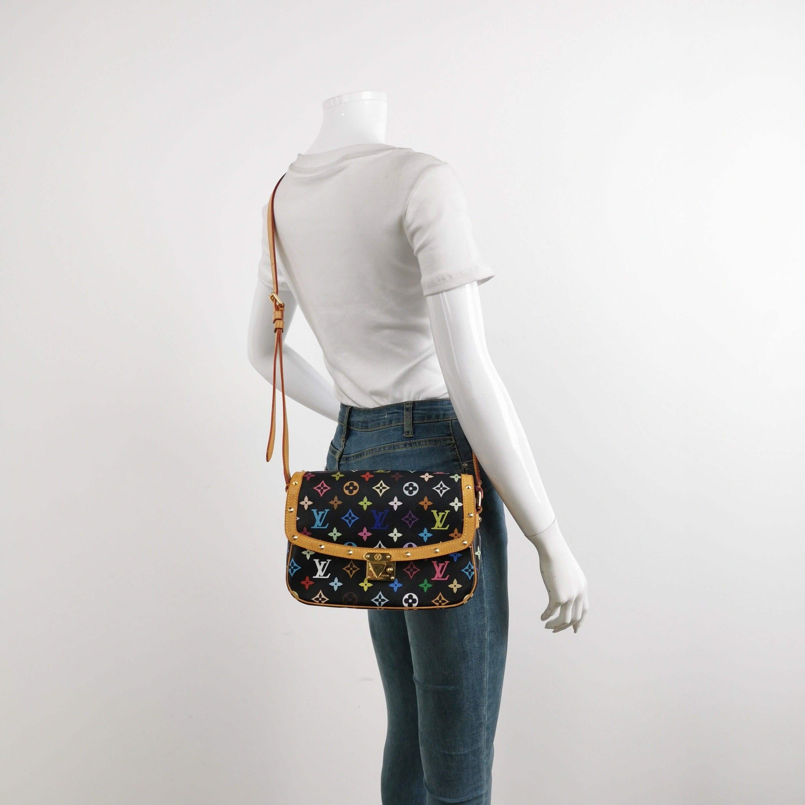 Louis Vuitton x Takashi Murakami Sologne Messenger Crossbody Bag Black Multicolor
 These are professional photos of the actual bag .
 Design by the French fashion house, Louis Vuitton in collaboration with Takashi Murakami.
 Condition: GOOD
 This