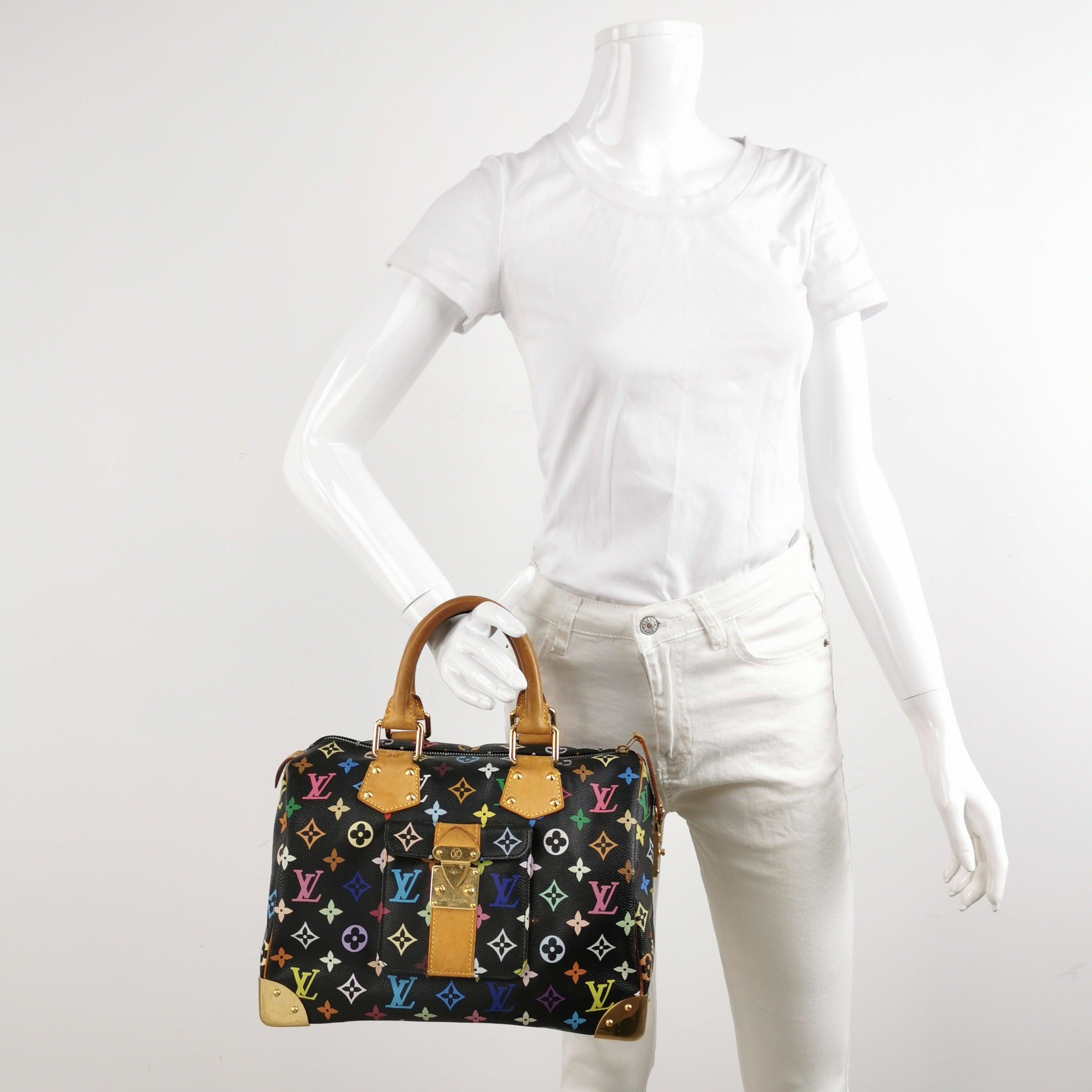 Louis Vuitton x Takashi Murakami Speedy 30 Lock Black Multicolor
 These are professional photos of the actual bag .
 Design by the French fashion house, Louis Vuitton in collaboration with Takashi Murakami.
 Condition: GOOD
 This authentic preloved/