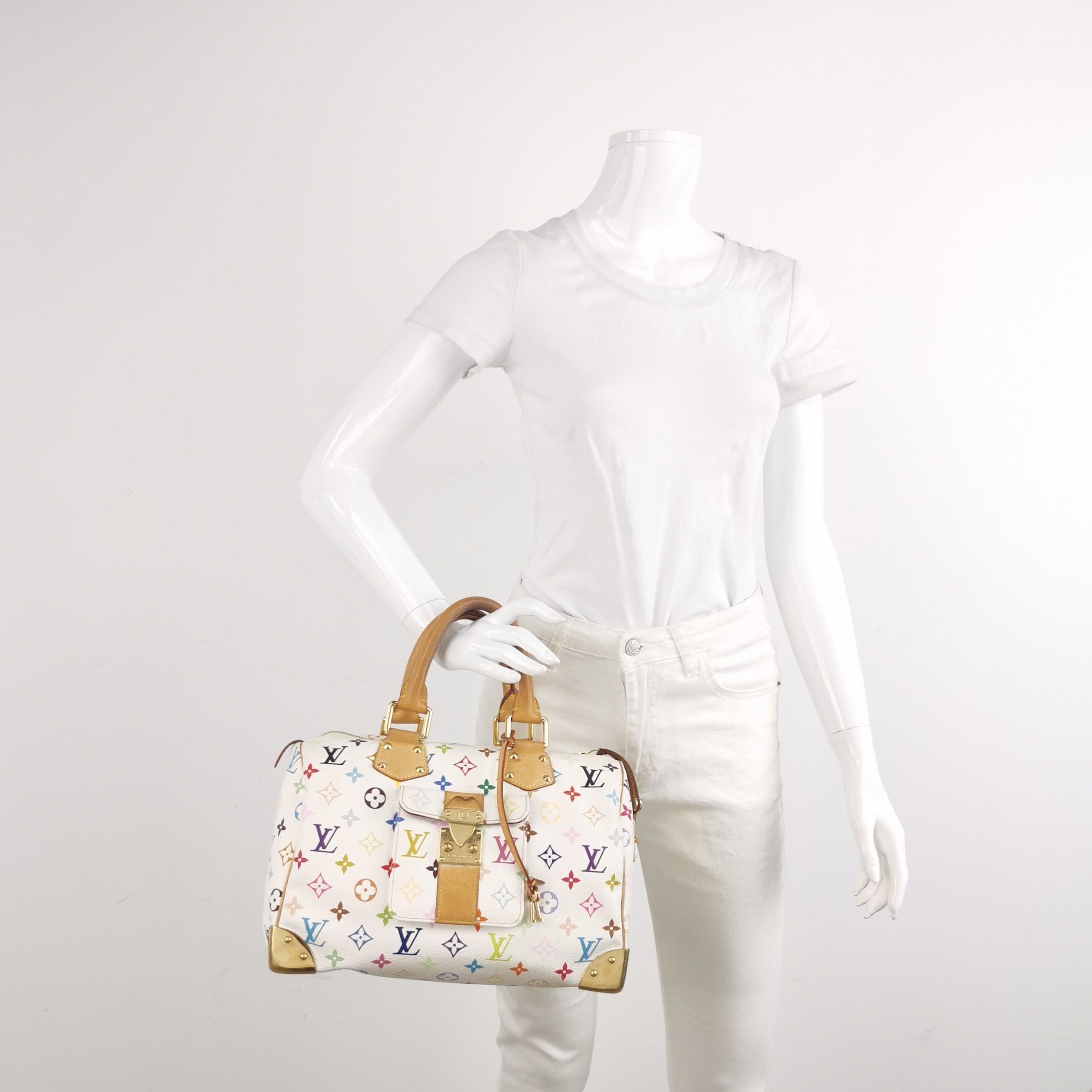 Louis Vuitton x Takashi Murakami Speedy 30 Lock White Multicolor
 These are professional photos of the actual bag.
 Design by the French fashion house, Louis Vuitton in collaboration with Takashi Murakami.
 Condition: GOOD
 This authentic preloved/