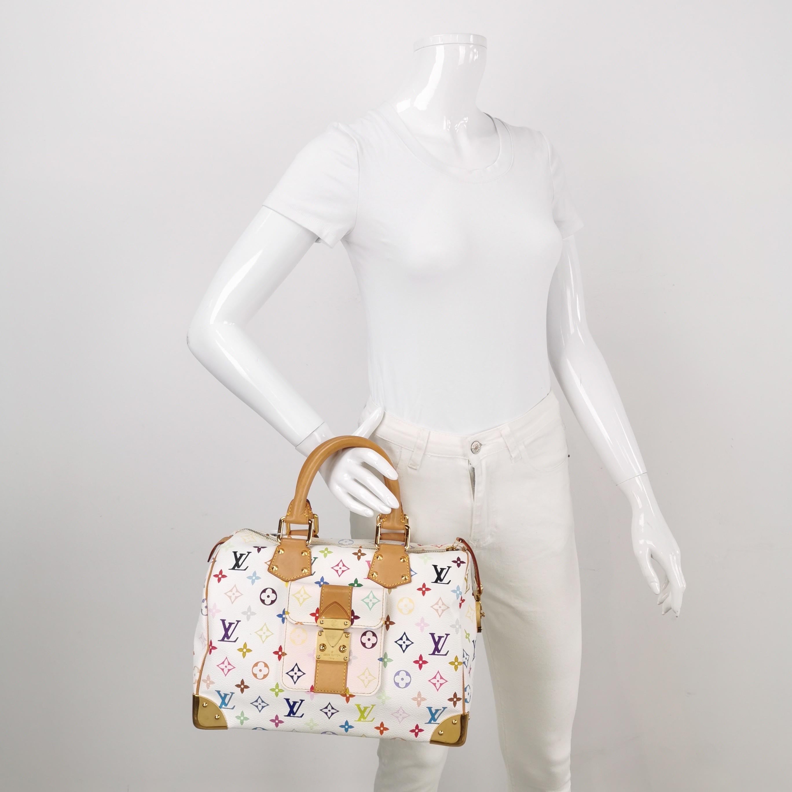 Design by the French fashion house, Louis Vuitton in collaboration with Takashi Murakami.

Condition: VERY GOOD

This authentic preloved/ preowned Louis Vuitton bag is in good condition with moderate signs of use. Water mark on the leather, light