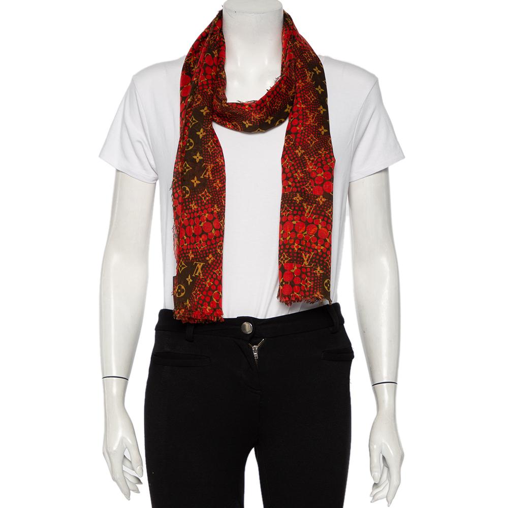 In collaboration with famed Japanese artist Yayoi Kusama, Louis Vuitton released limited designs dominated by polka dots. This LV scarf is from that collaboration. It is made from cotton and covered in Kusama's signature dots and LV's monogram.

