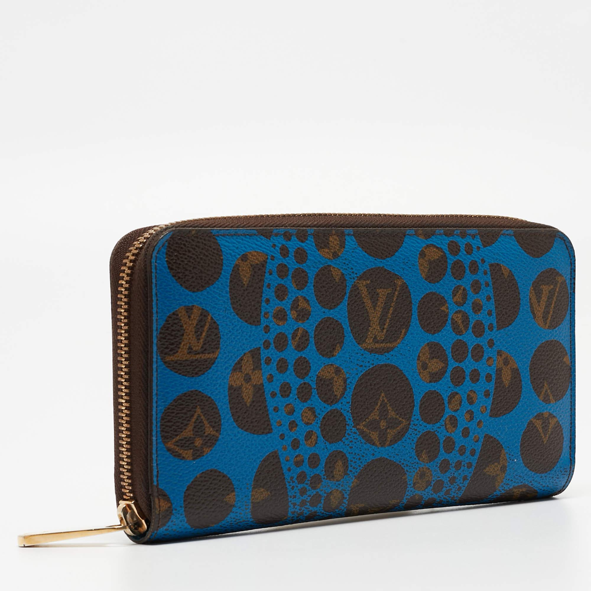 This wallet from Louis Vuitton is a limited edition design from the collection created with Yayoi Kusama. The pair is crafted using Monogram canvas and adorned with Kusama's signature bold spots all over.

Includes: Original Dustbag, Original Box,