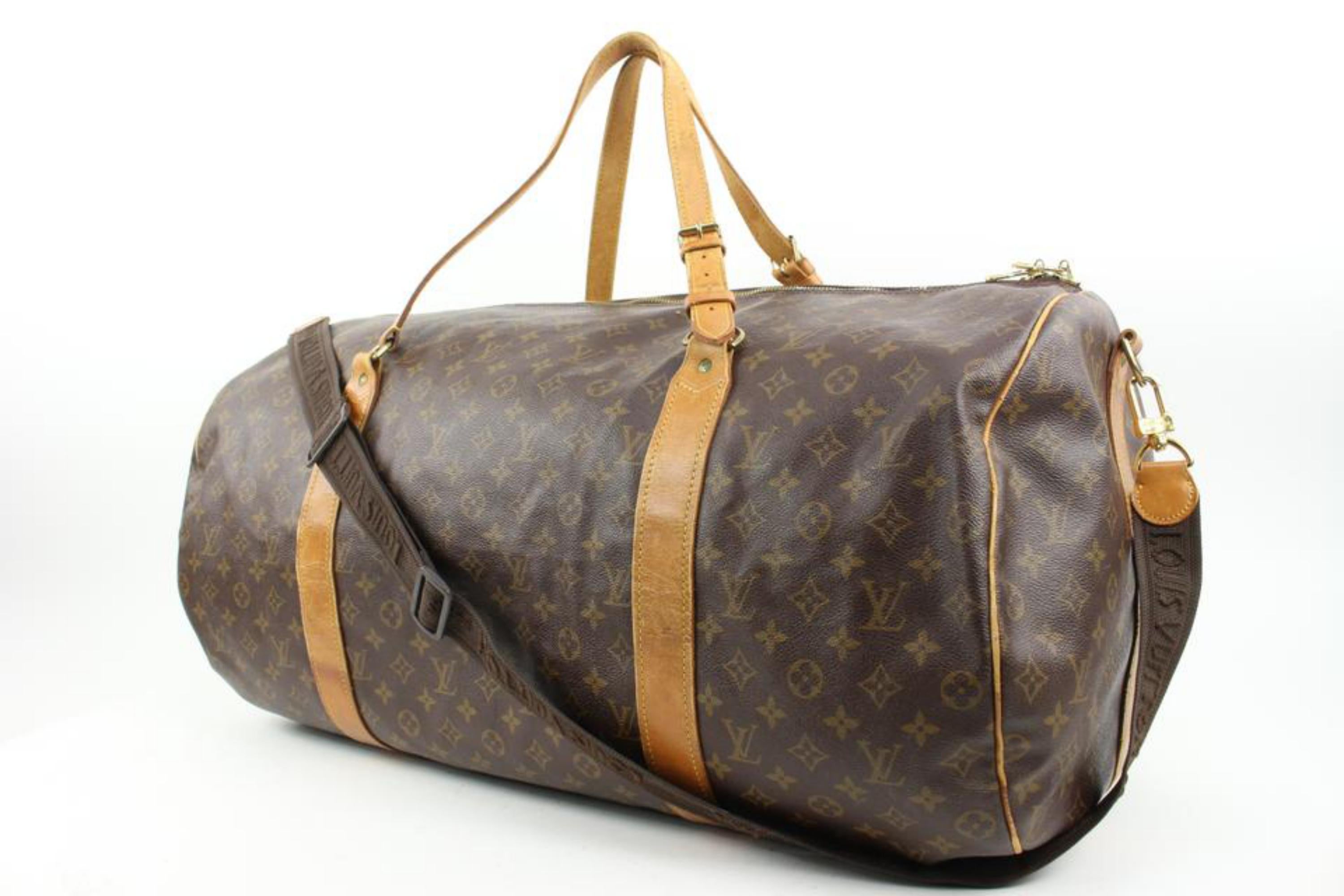 Louis Vuitton XL Monogram Sac Polochon 70 Keepall Bandouliere s214lv89
Date Code/Serial Number: A11903
Made In: France
Measurements: Length:  26.5