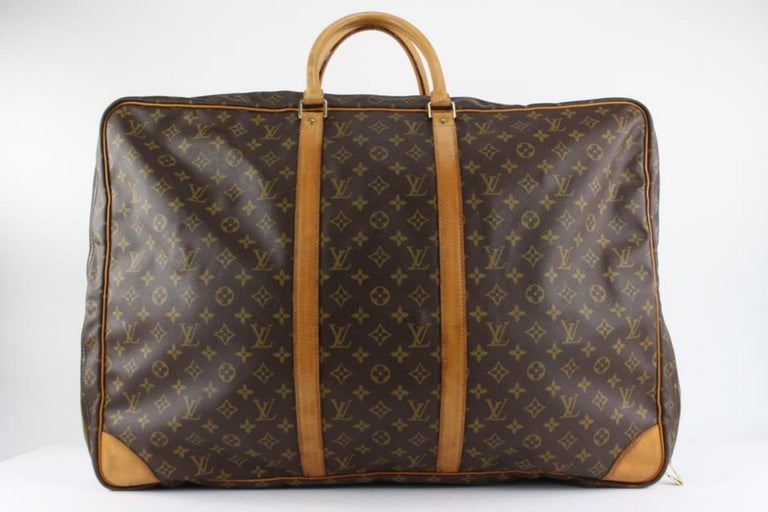 Louis Vuitton Sirius 65 suitcase in brown monogram canvas and natural  leather