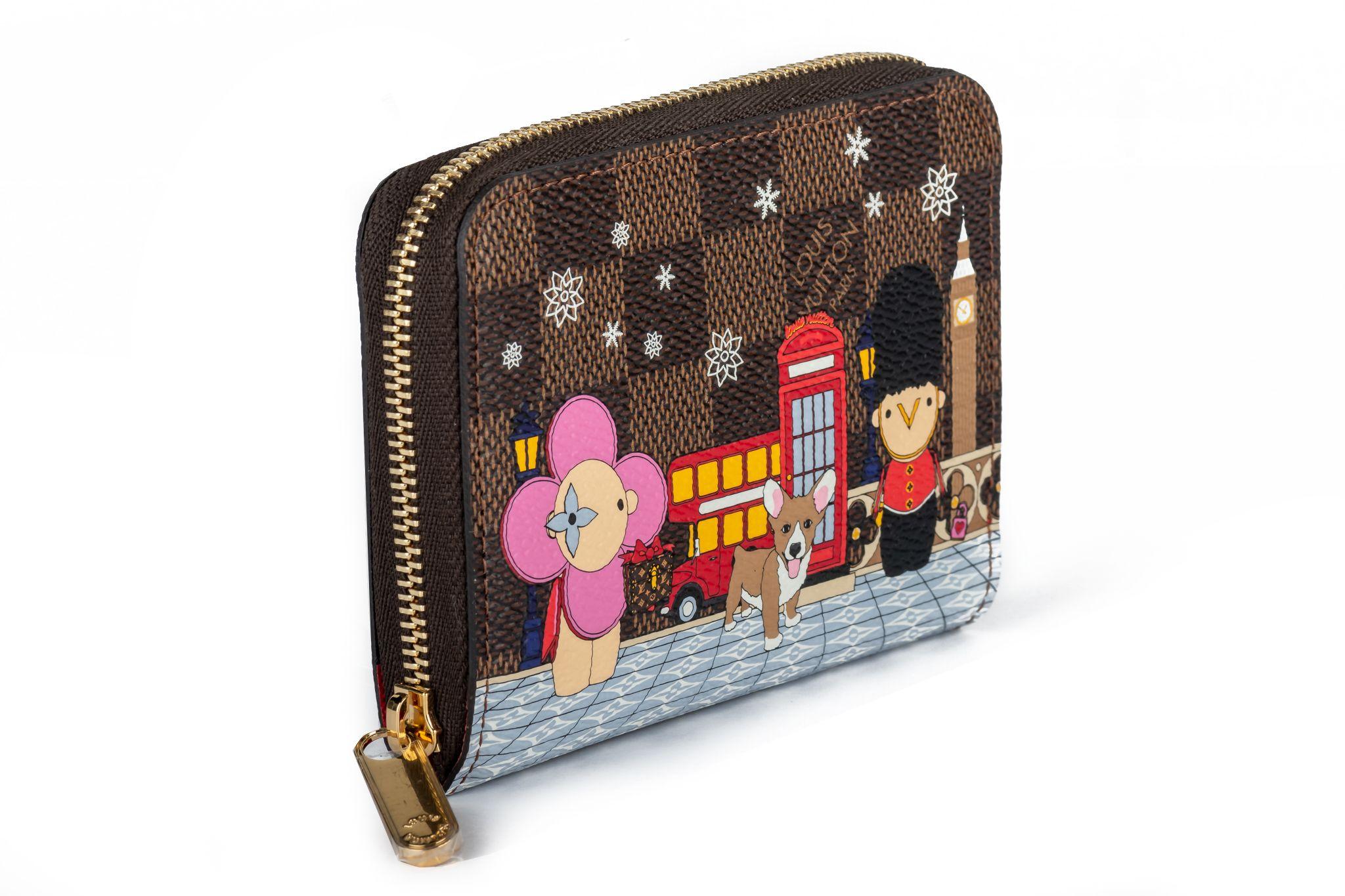 Louis Vuitton’s cute coin purse becomes even more adorable thanks to a print of Vivienne in London Town. Vivienne is the House’s mascot and here she’s seen with a Welsh Guard. Lined in red leather, the purse can securely carry coins, cards, and