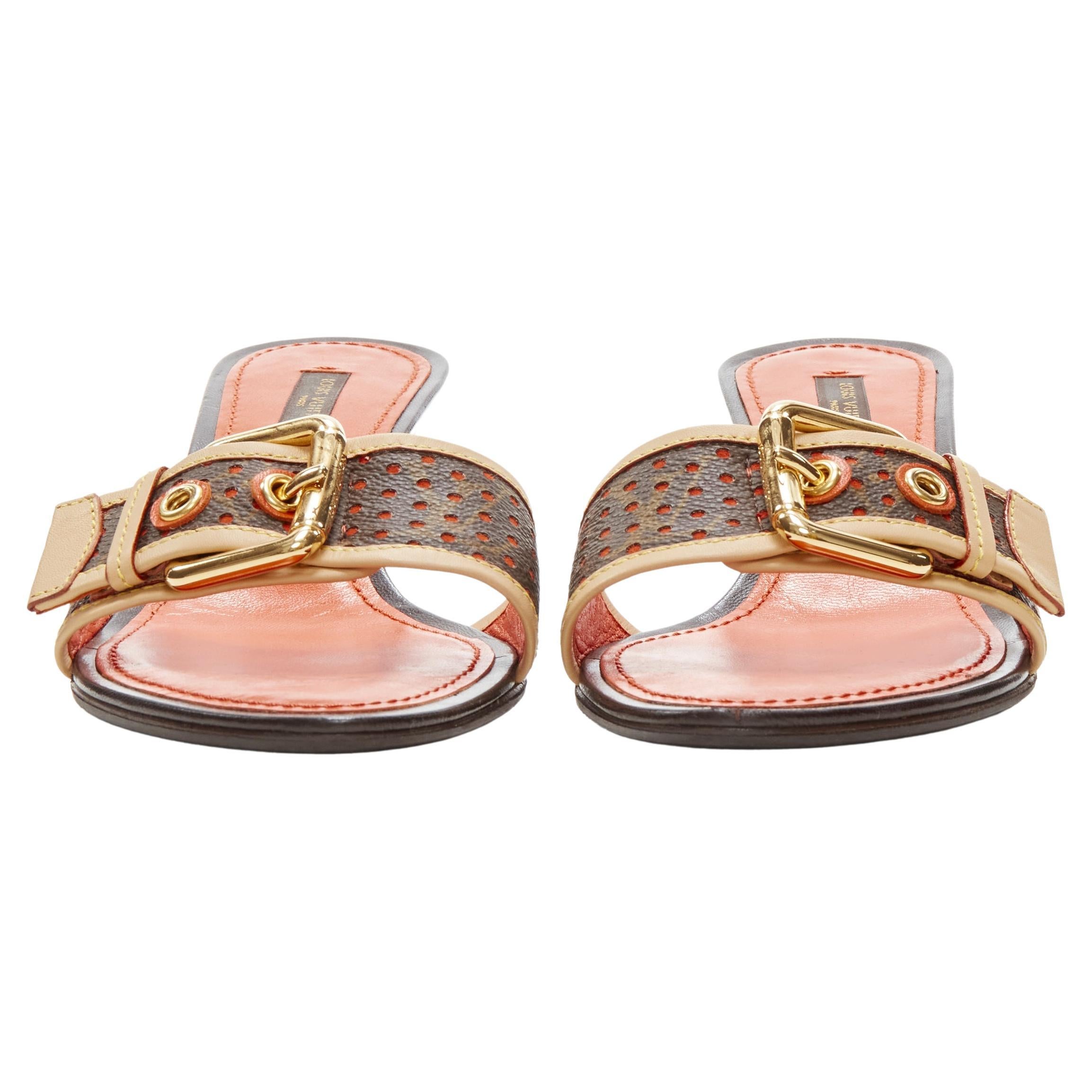LOUIS VUITTON Y2K orange perforated LV monogram gold buckle heel sandal EU36.5
Brand: Louis Vuitton
Material: Leather
Color: Brown
Pattern: Monogram
Extra Detail: Gold-tone buckle.
Made in: Italy

CONDITION:
Condition: Excellent, this item was