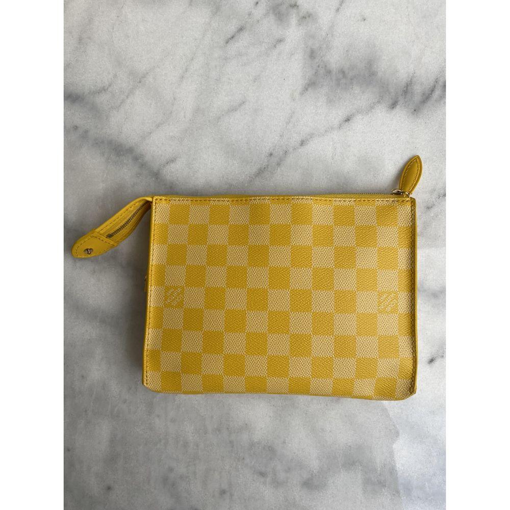 - Designer: LOUIS VUITTON
- Condition: Good condition. Minor sign of wear on base corners
- Accessories: Box, Dustbag
- Measurements: Width: 20cm , Height: 15cm , Depth: 
- Exterior Material: Canvas
- Exterior Color: Yellow
- Interior Material: