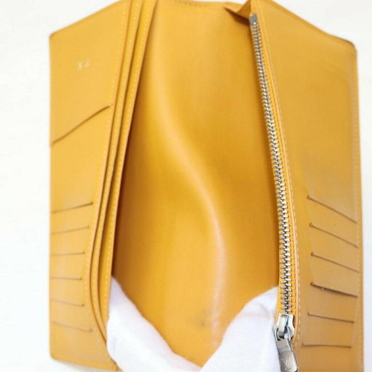 Cartera Larga Louis Vuitton de Piel Damier Infini Amarillo Portefeuille Brazza 8