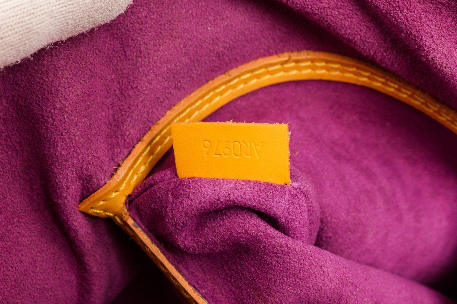 Louis Vuitton Yellow Epi Leather Alma MM Hobo Bag In Good Condition In Irvine, CA