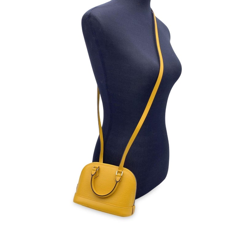 Louis Vuitton Yellow Epi Leather Alma Nano Mini Crossbody Bag For Sale at  1stDibs