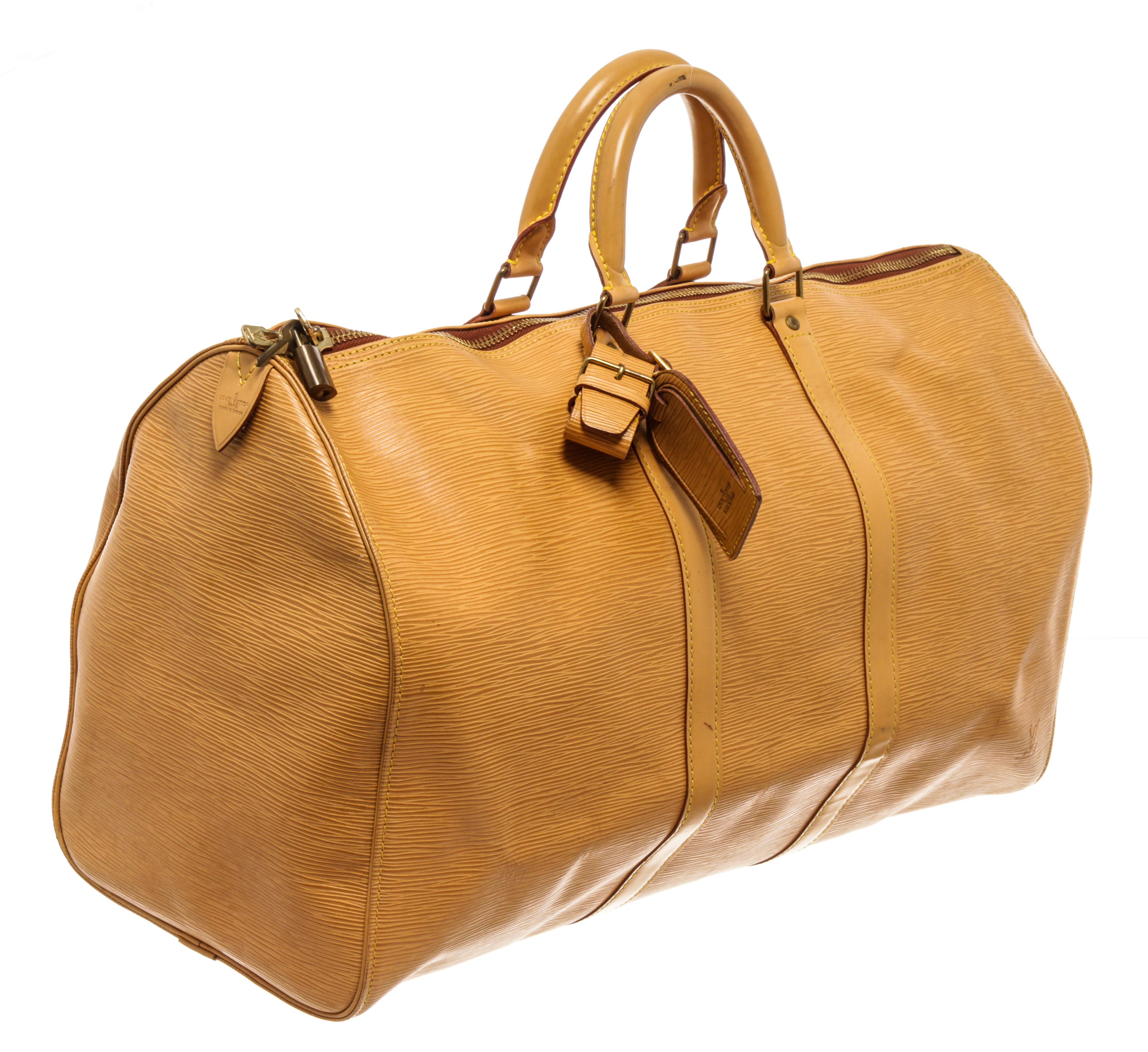 Louis Vuitton Yellow Epi Leather Keepall 50 cm Duffle Luggage Bag with brass hardware, leather trim, exterior side patch pocket, leather luggage tag, brown alcantara lining, dual rolled leather top handles, and zip closure with LV key