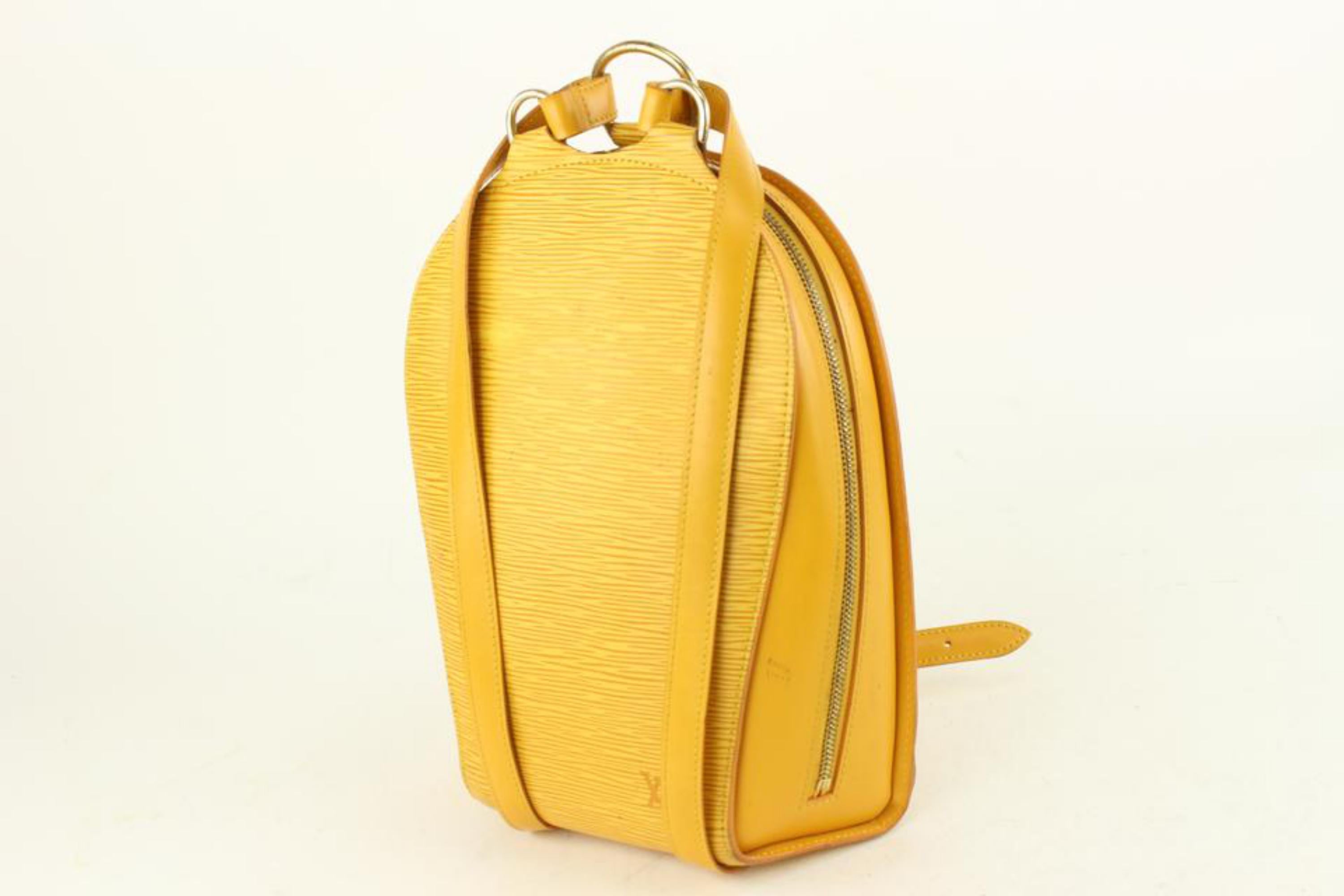 Louis Vuitton Yellow Epi Leather Mabillon Backpack 6lv1108
Date Code/Serial Number: VI1977
Made In: France
Measurements: Length: 8 