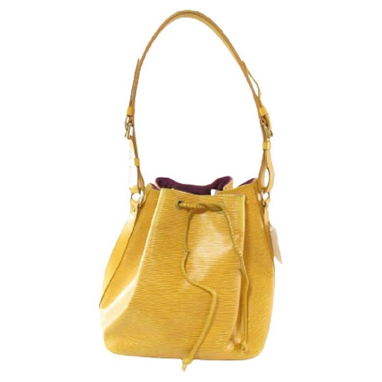 Sold at Auction: Louis Vuitton, LOUIS VUITTON NOE GM YELLOW EPI BUCKET BAG