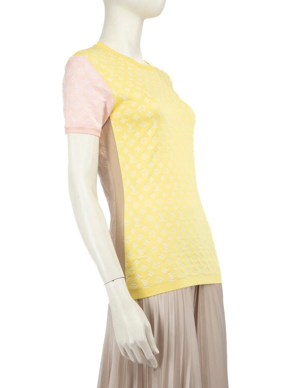 CONDITION is Very Good. Hardly any visible wear to the top is evident on this used Louis Vuitton designer resale item. This item comes in the original box.
  
  Details
  
  
  Yellow 
  
  Silk 
  
  Top 
  
  Short sleeves 
  
  Monogram pattern 
