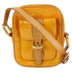 Mini sac à bandoulière Louis Vuitton jaune-orange monogrammé Vernis Christie PM 