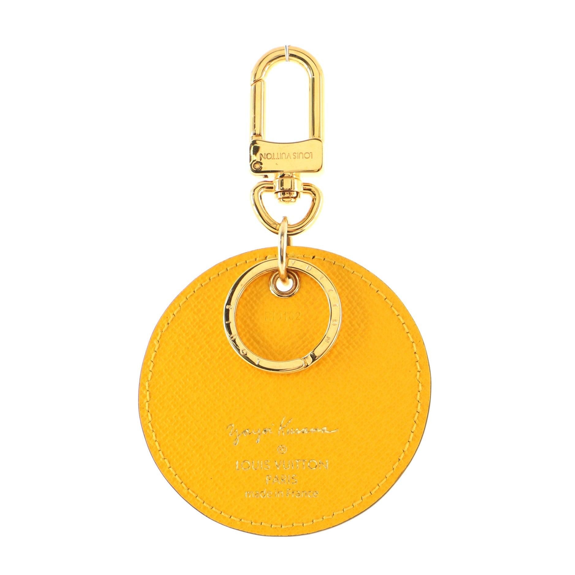 Louis Vuitton Yellow Yayoi Kusama Pumpkin Dots Monogram Limited Edition Round Key Holder features gold-tone hardware with canvas coated leather and yellow pumpkin dots as a signature pattern from artist Yayoi Kusama.

 

63769MSC