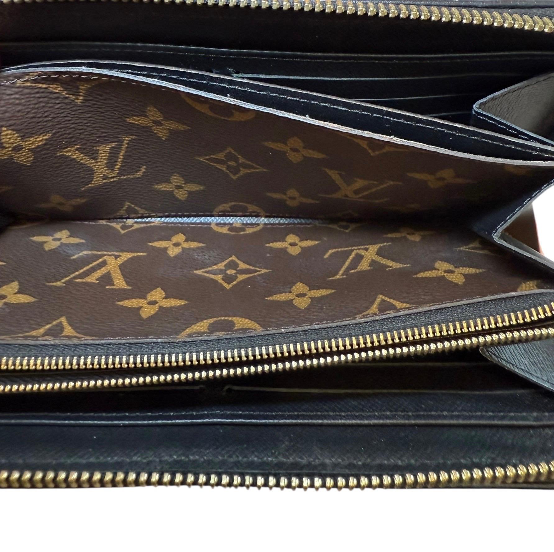 Louis Vuitton Zippy Wallet NM in tela Monogram con angoli in pelle nera 2019 in vendita 10