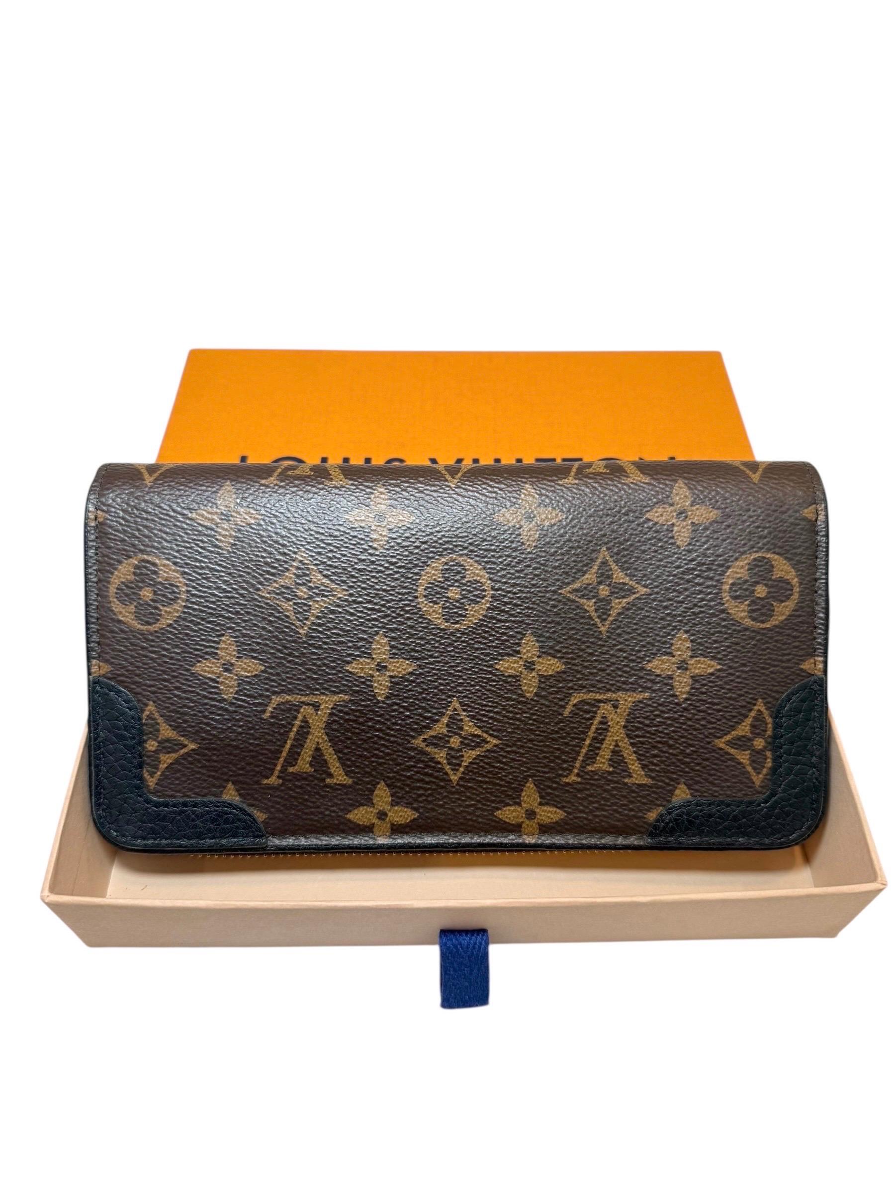Portafoglio Louis Vuitton Zippy NM in tela Monogram con angoli in pelle nera (2019, Made in France)

Questo autentico Zippy Wallet NM di Louis Vuitton è realizzato nell'iconica tela rivestita Monogram con esclusivi rinforzi angolari in pelle nera e