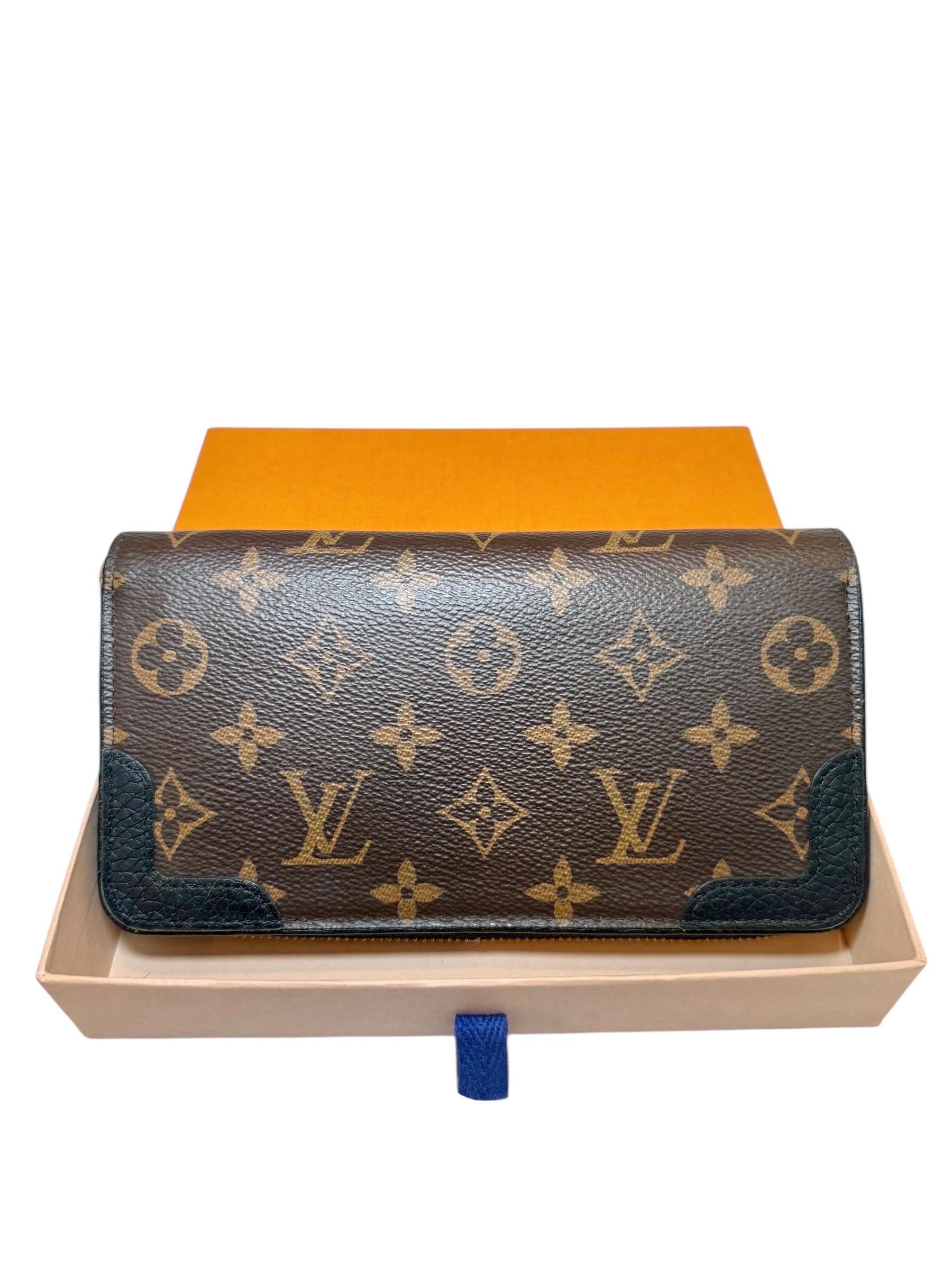 Louis Vuitton Zippy Wallet NM in tela Monogram con angoli in pelle nera 2019 In condizioni buone in vendita a Woodland Hills, CA