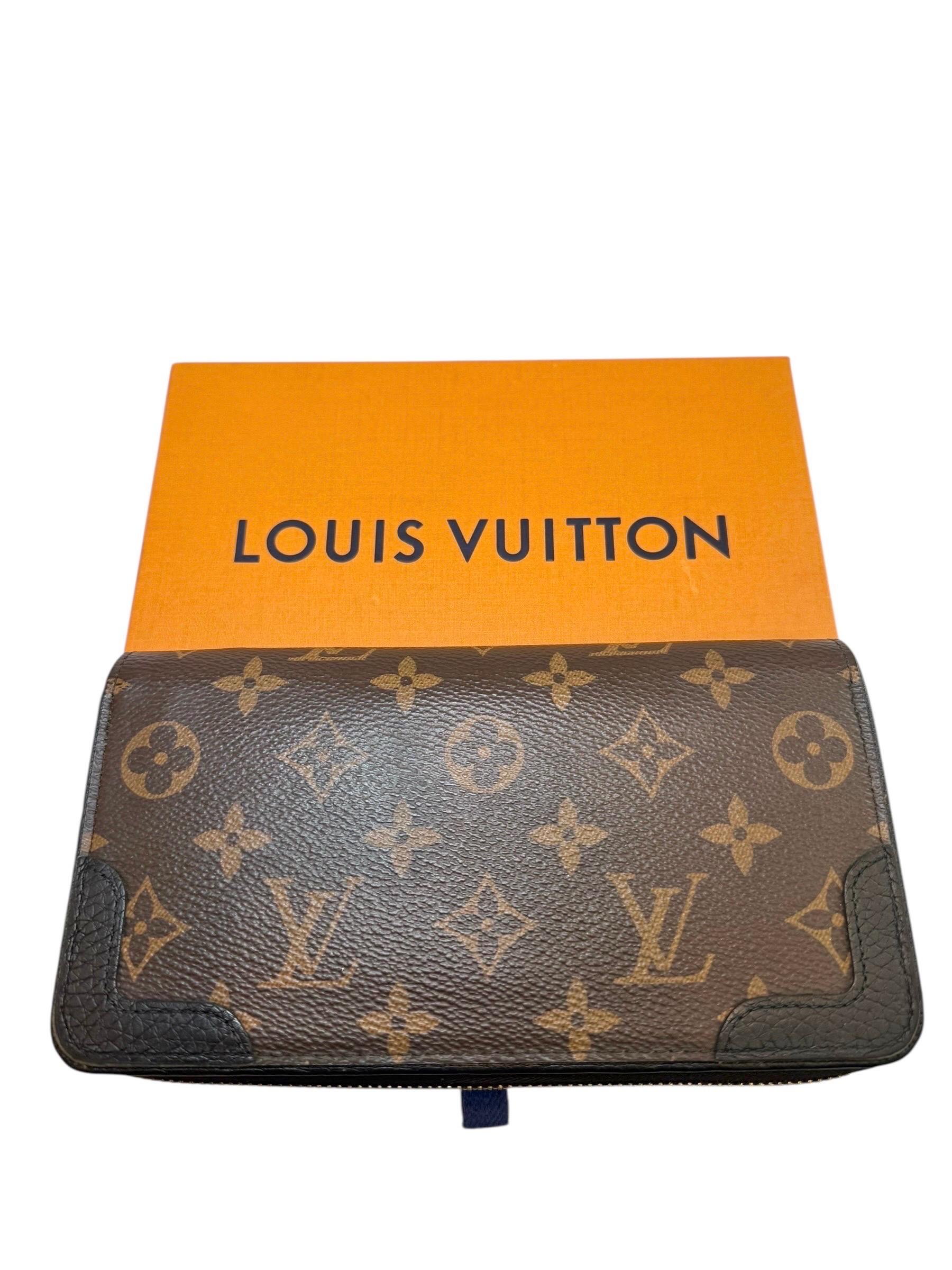 da uomo o donna Louis Vuitton Zippy Wallet NM in tela Monogram con angoli in pelle nera 2019 in vendita