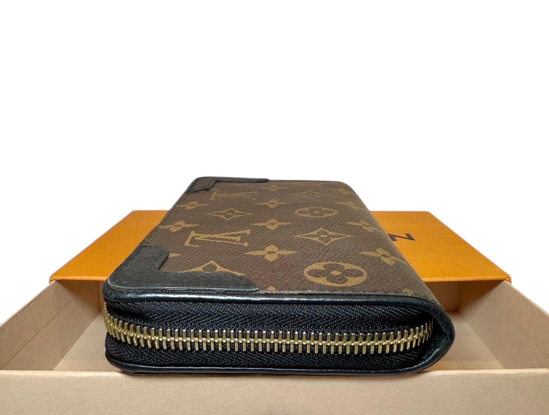 Louis Vuitton Zippy Wallet NM in tela Monogram con angoli in pelle nera 2019 in vendita 1