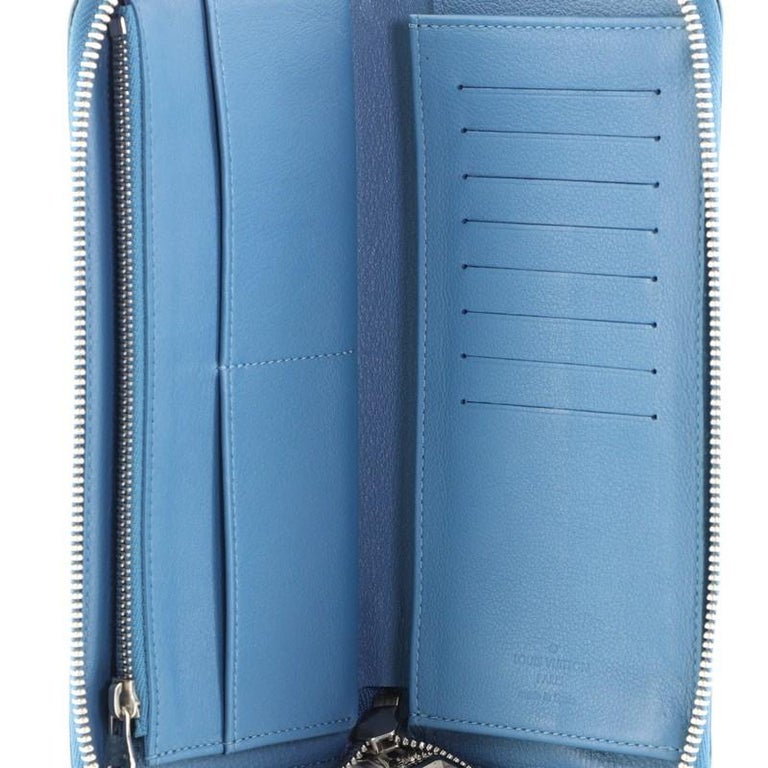 Louis Vuitton // Blue Taurillon Leather Vertical Zippy Wallet