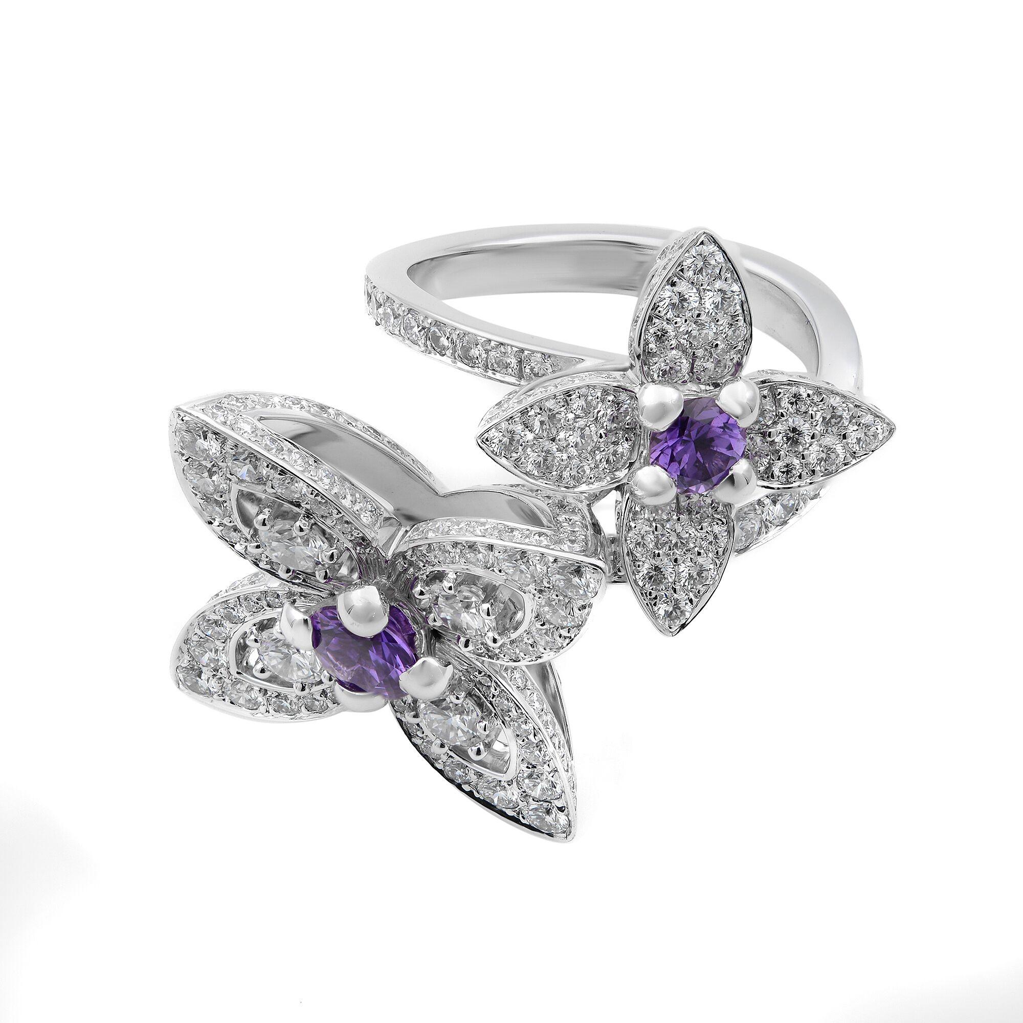 18k White Gold Diamond Amethyst Les Luxuriantes Flowers Ring by Louis Vuitton.
Set with 307 round brilliant cut diamonds VVS1 clarity E color
2 Amethyst Stones
Stamped Hallmarks: Louis Vuitton 750 53
Pre-owned like new, original packaging is not
