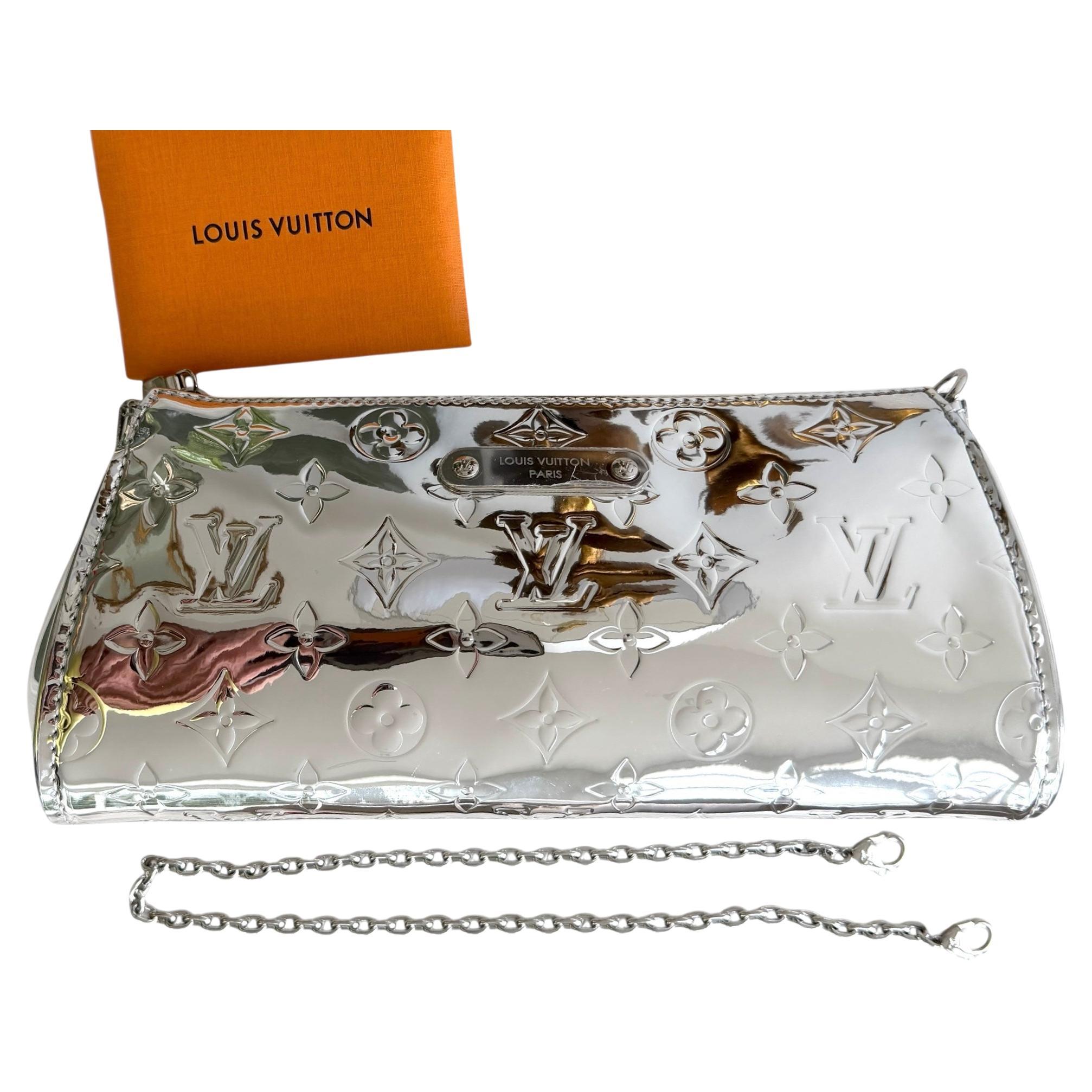 Louis Vutton Siver Monogram Mirror Pochette Eva