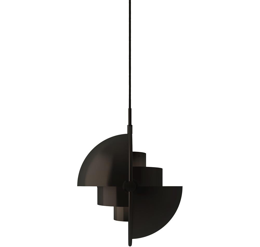 The Multi-Lite Pendant embraces the golden era of Danish design with its characteristic shape of two opposing outside, mobile shades that enable creating a personal installation and a wide range of lighting values in a room. By individually rotating