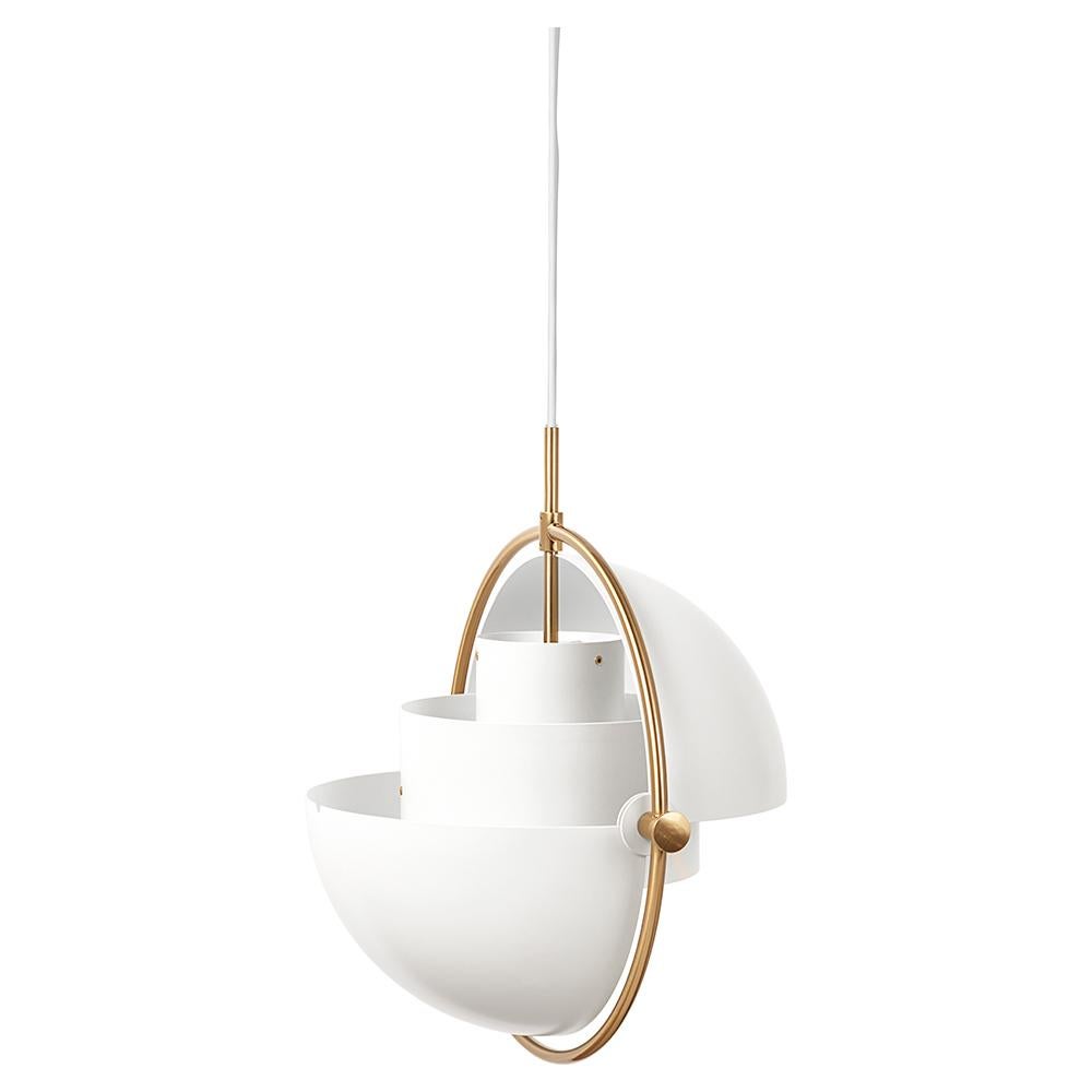 The Multi-Lite Pendant embraces the golden era of Danish design with its characteristic shape of two opposing outside, mobile shades that enable creating a personal installation and a wide range of lighting values in a room. By individually rotating