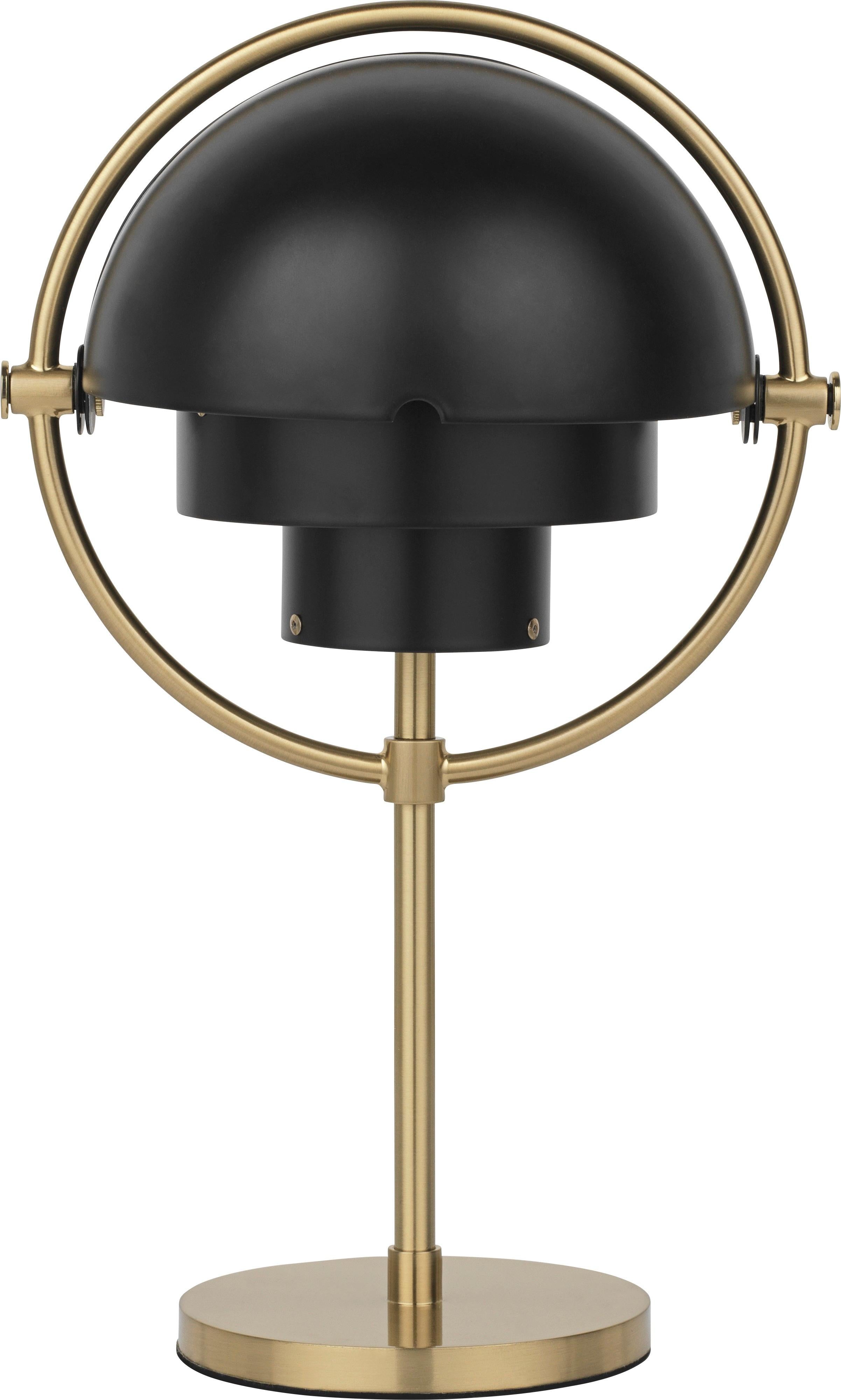 Lampe de table portable 'Multi-Lite' de Louis Weisdorf en noir et laiton pour Gubi 

Conçue en 1972 par Weisdorf, cette nouvelle version portable du design emblématique de Weisdorf a été créée par la société danoise GUBI, qui reproduit