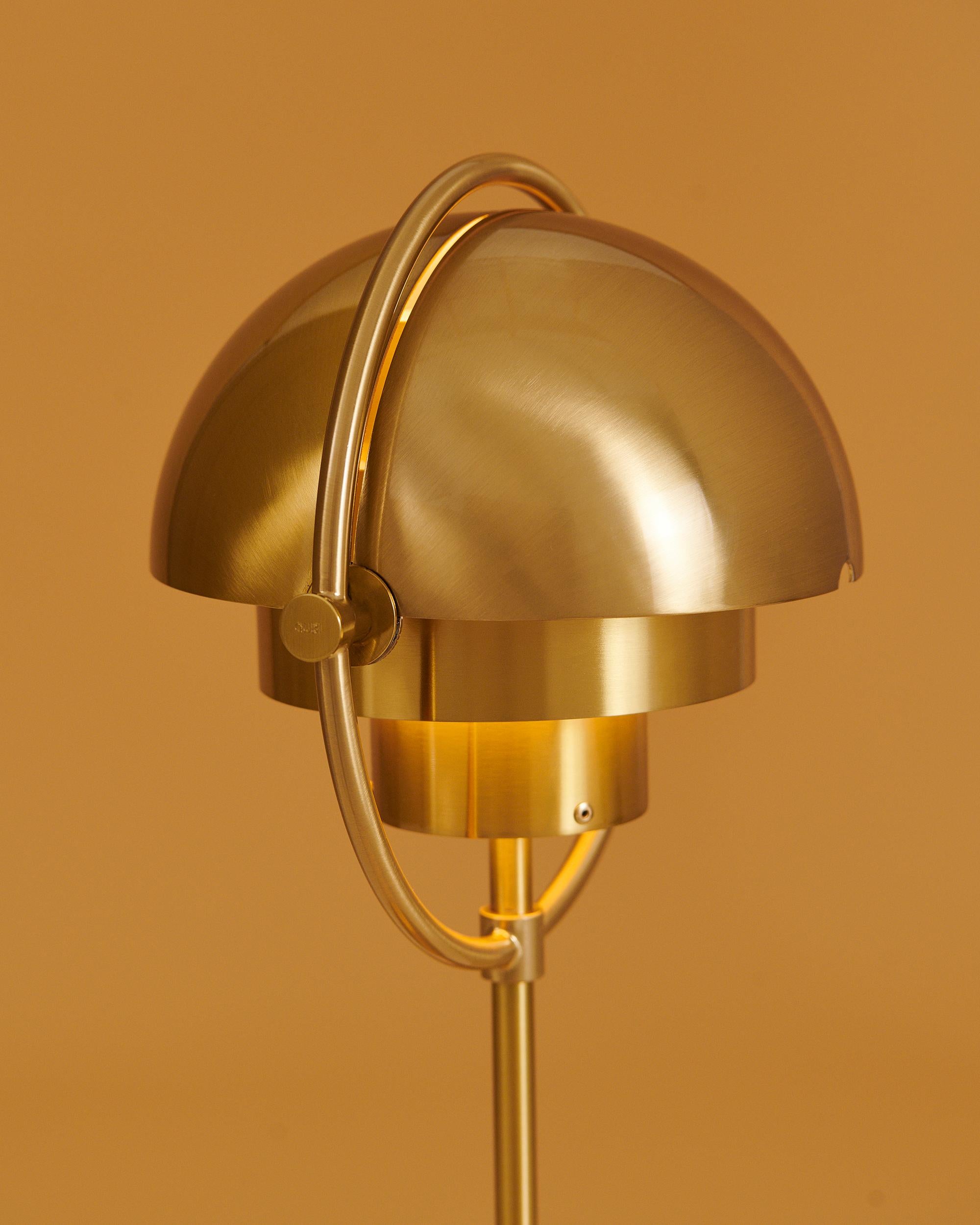 Louis Weisdorf 'Multi-Lite' Portable Table Lamp in Brass.

Designed in 1972 by Weisdorf, this new portable version of Weisdorf's iconic design was created by GUBI of Denmark, who meticulously reproduce his work with scrupulous attention to detail