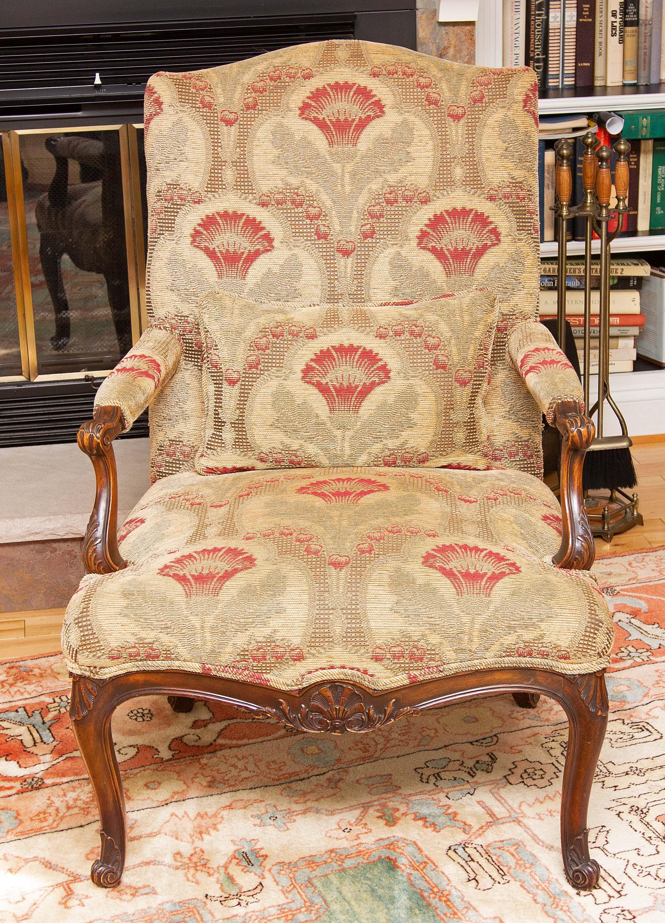 19th century French carved walnut arm chair. Good tapestry upholstery. Chair is comfortable.
 