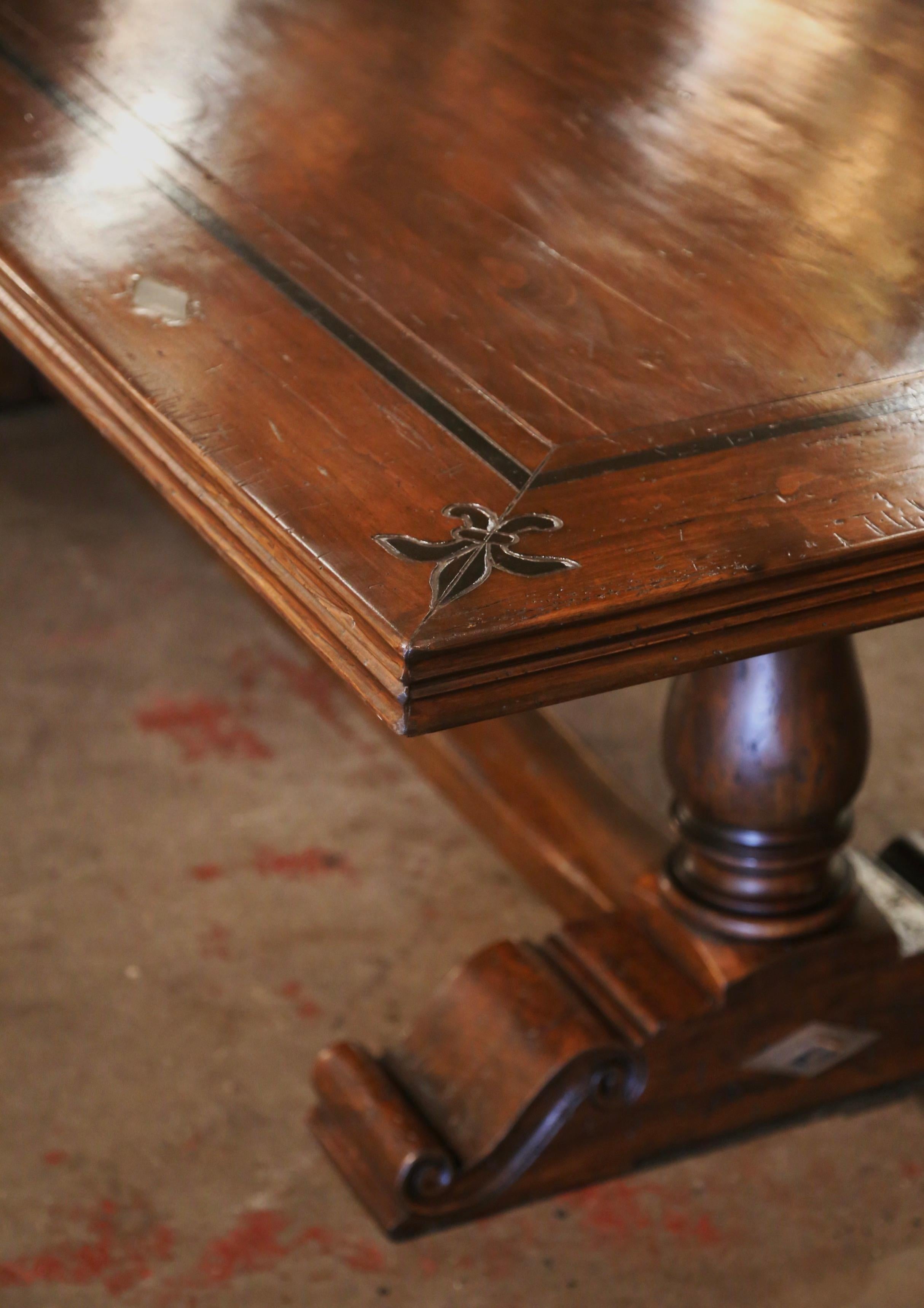 20th Century  Louis XIII French Carved Walnut Trestle Farm Table with Fleurs-de-Lys Motifs