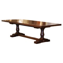 Louis XIII French Carved Walnut Trestle Farm Table with Fleurs-de-Lys Motifs