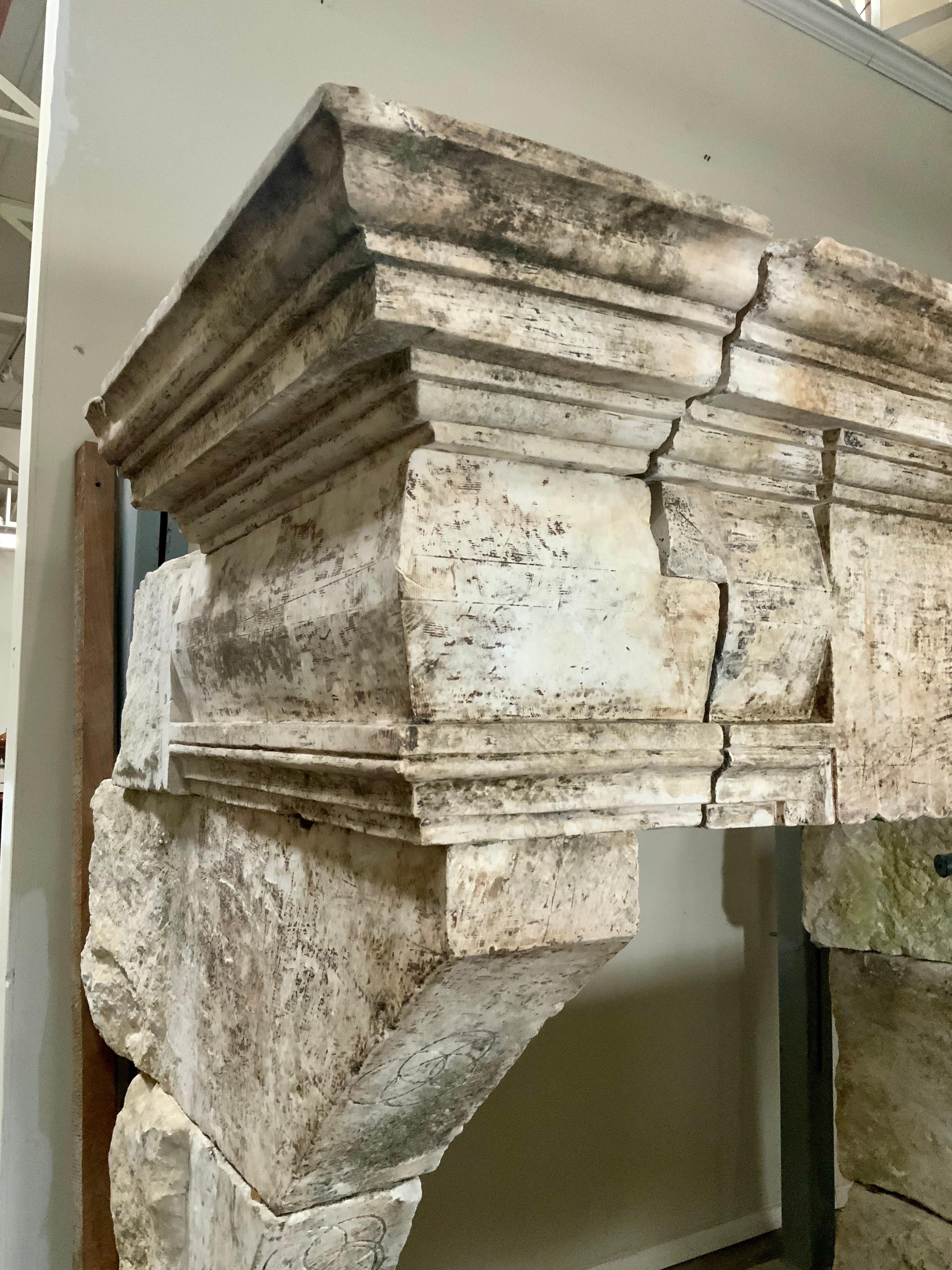 This limestone fireplace origins from France, circa 1650.

Firebox measurements: W 60