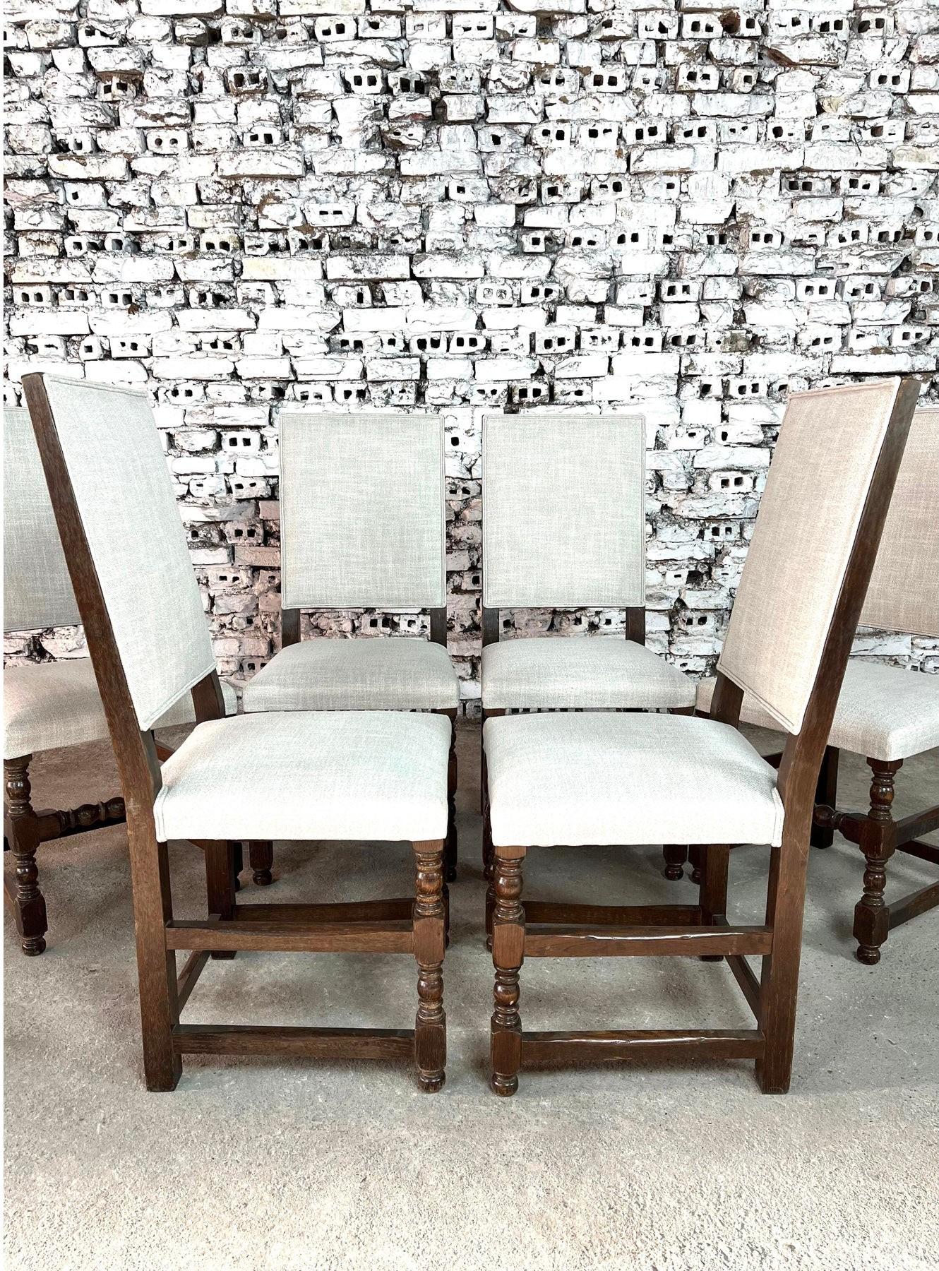 Dimensions: H 39.9” x W 17.9” x D 17.3” x SH 18.8”

Set of 6 French Louis XIII style dining chairs. Constructed from solid oak with high backs, newly upholstered in off-white/grey fabric. This set will bring a touch of tradition to any dining