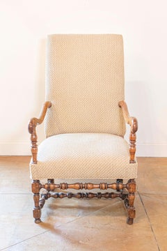 Louis XIII Style Walnut French Fauteuil with Scrolling Arms and Turned Base