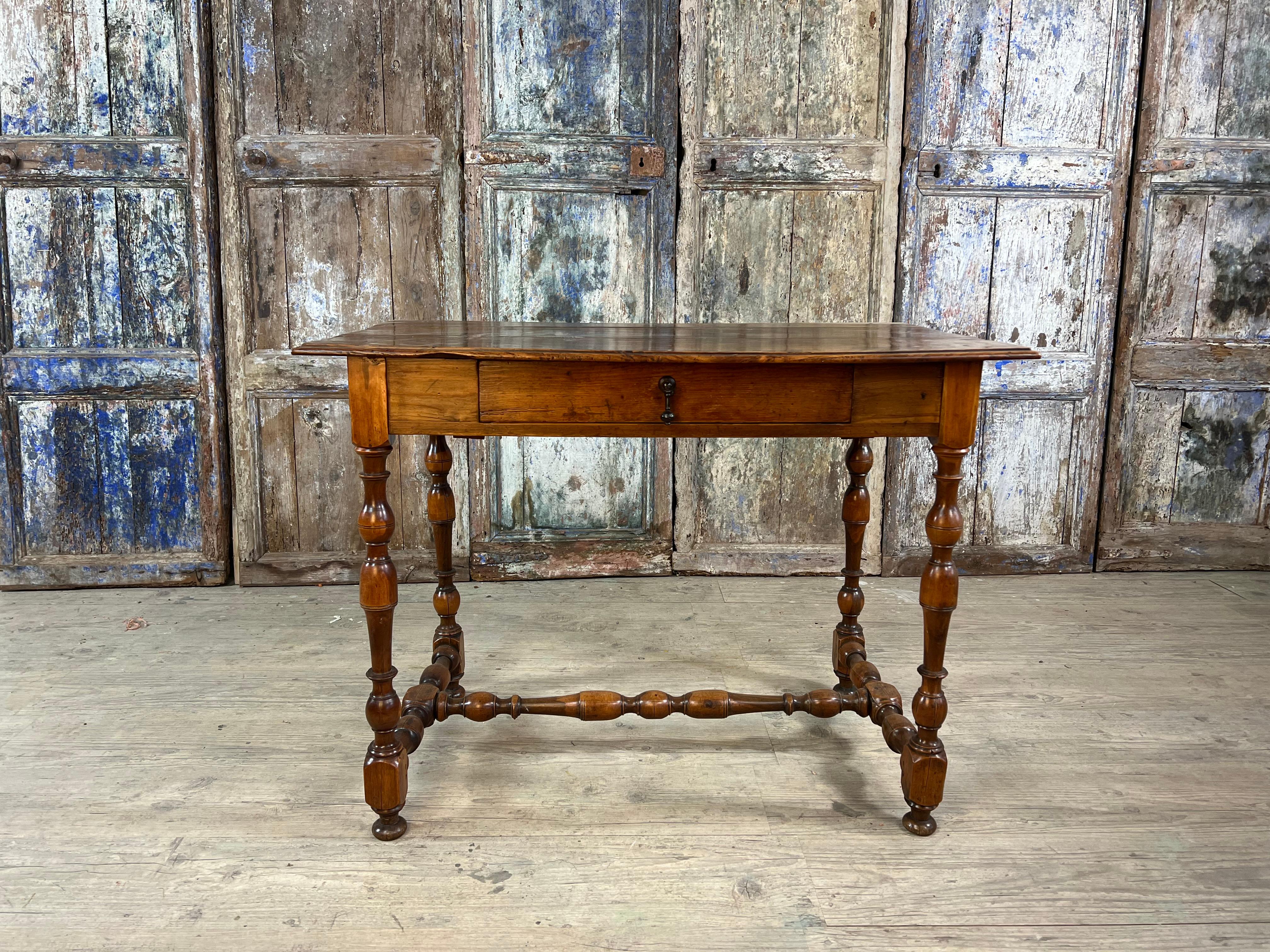 Rare Louis XIII table in solid guaiac wood, a precious and dense exotic hardwood, dating from the late 17th to early 18th century. This elegant 17th-century period table reflects the refined structure and symmetry of authentic Louis XIII furniture,