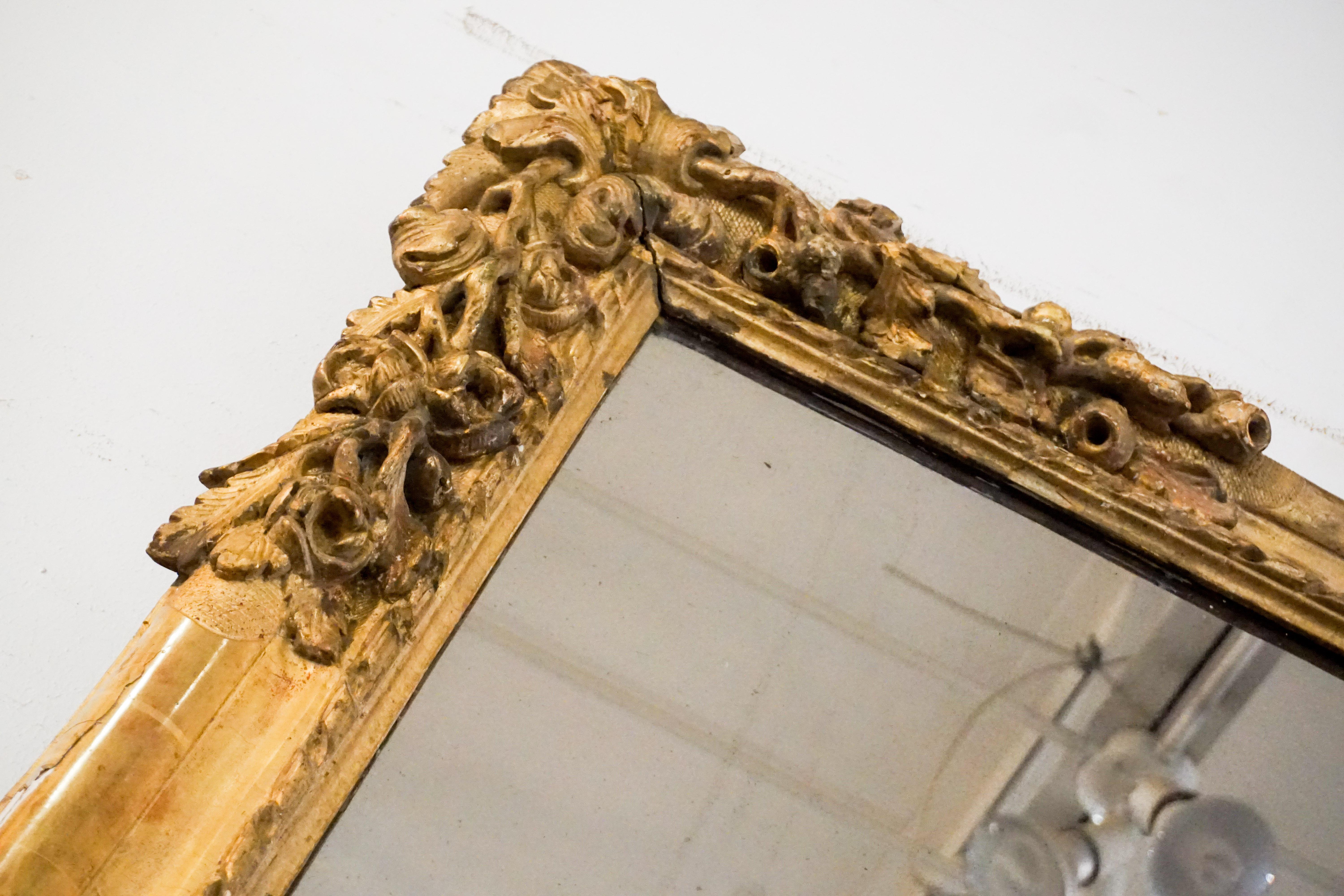 Antique gold leaf mirror.

Origin: France, circa 1780

Measurements: 48
