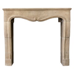Louis XIV Limestone Fireplace