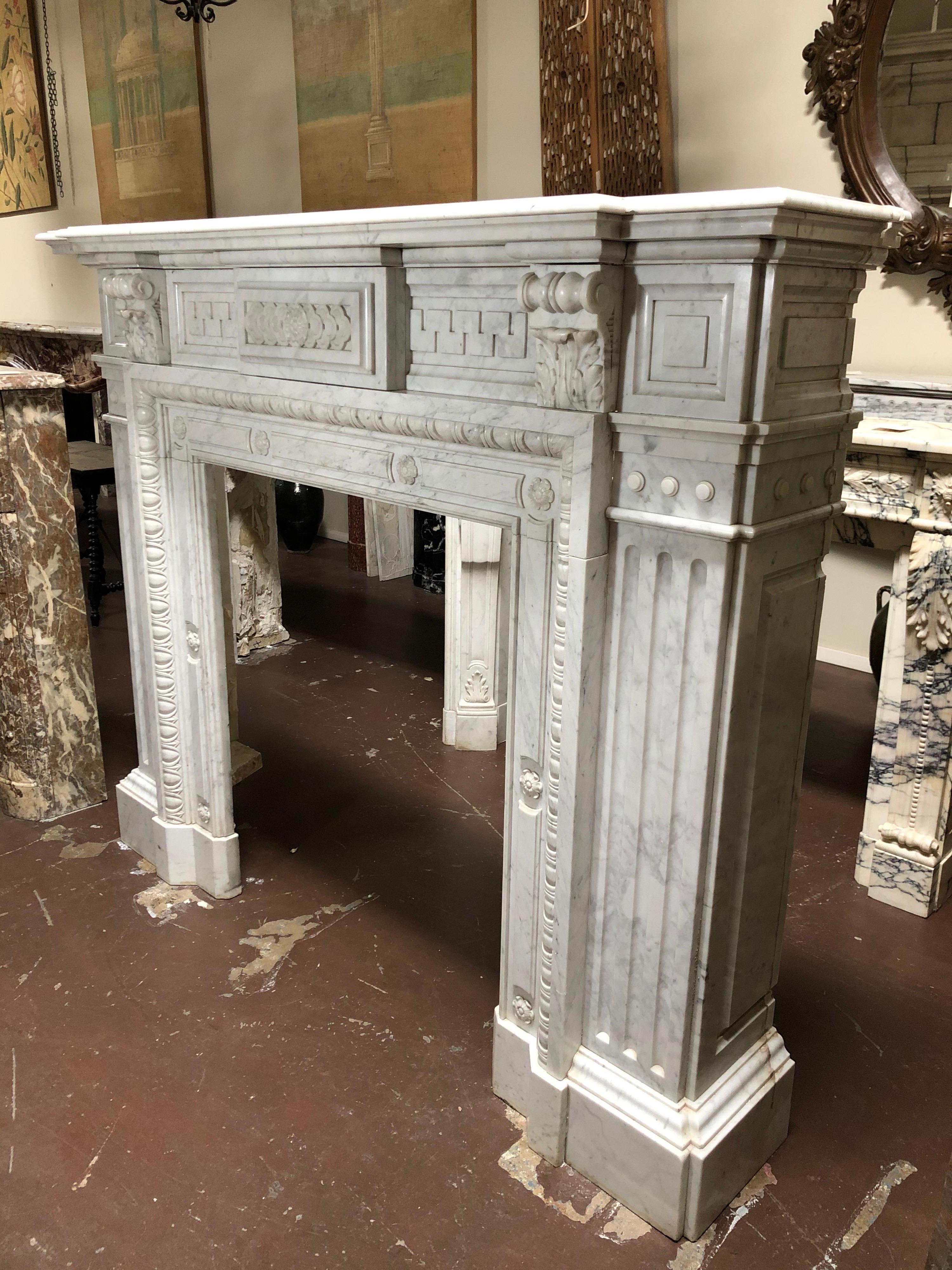 This Louis XIV marble fireplace origins from France, circa 1850.
Beautiful details.

Firebox : W 33