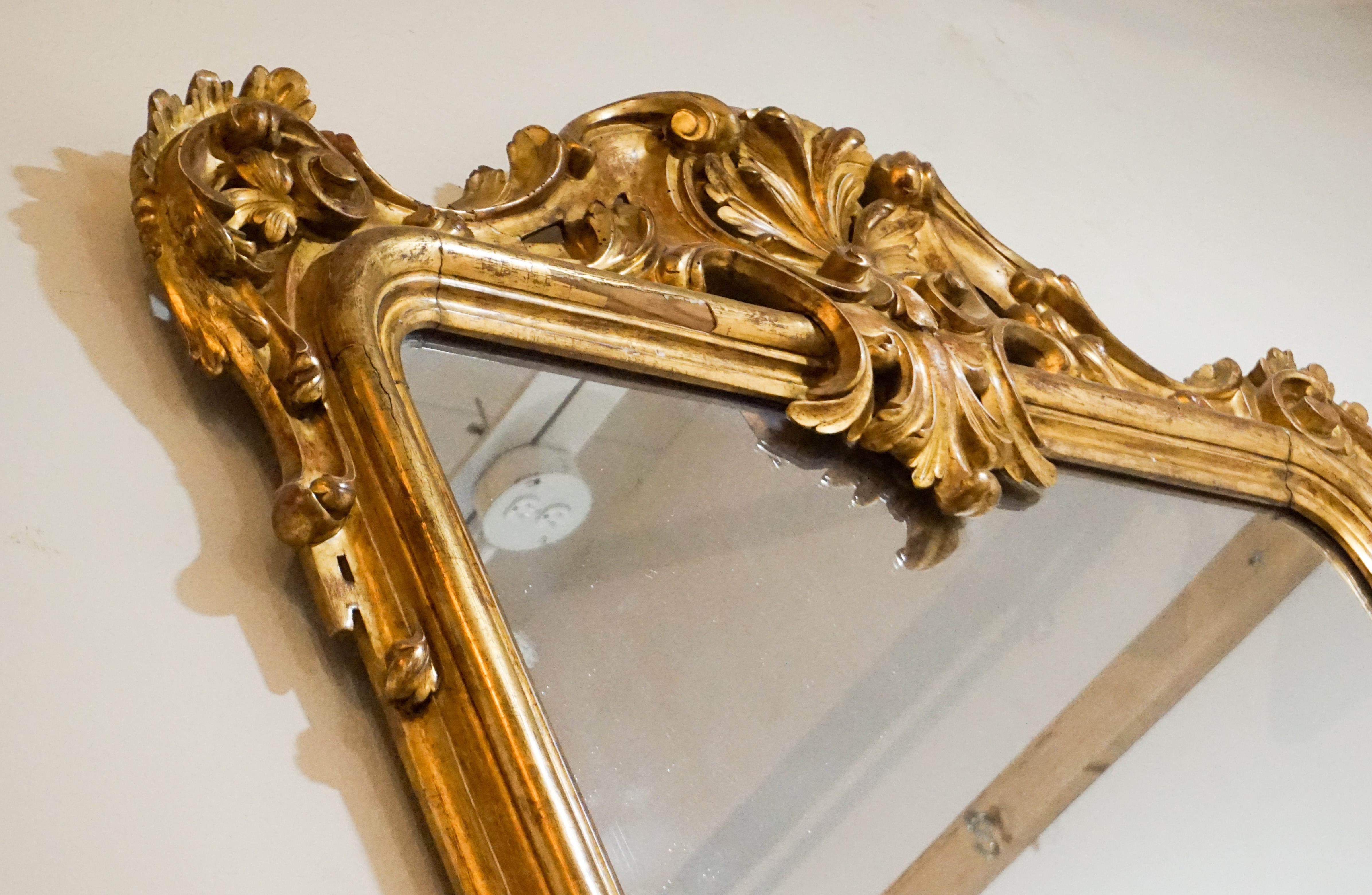 Antique gold leaf mirror.

Origin: France, circa 1800.

Measurements: 48