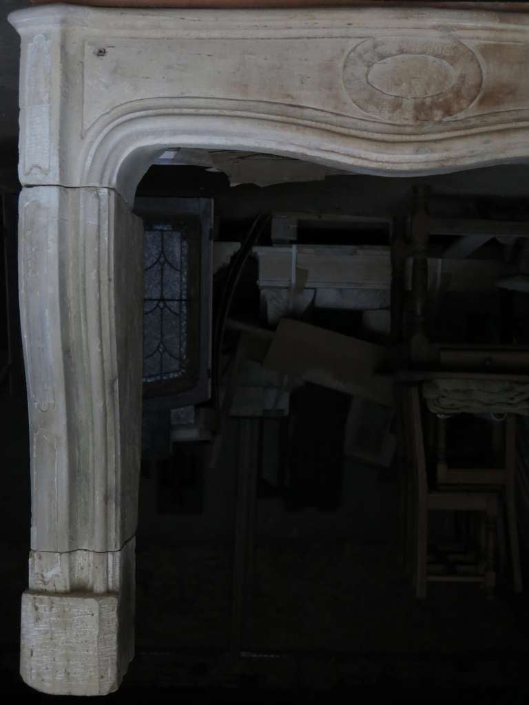 Antique Stone Fireplace Louis XIV Style Hand-Carved 18th Century from France. In Good Condition For Sale In LOS ANGELES, CA